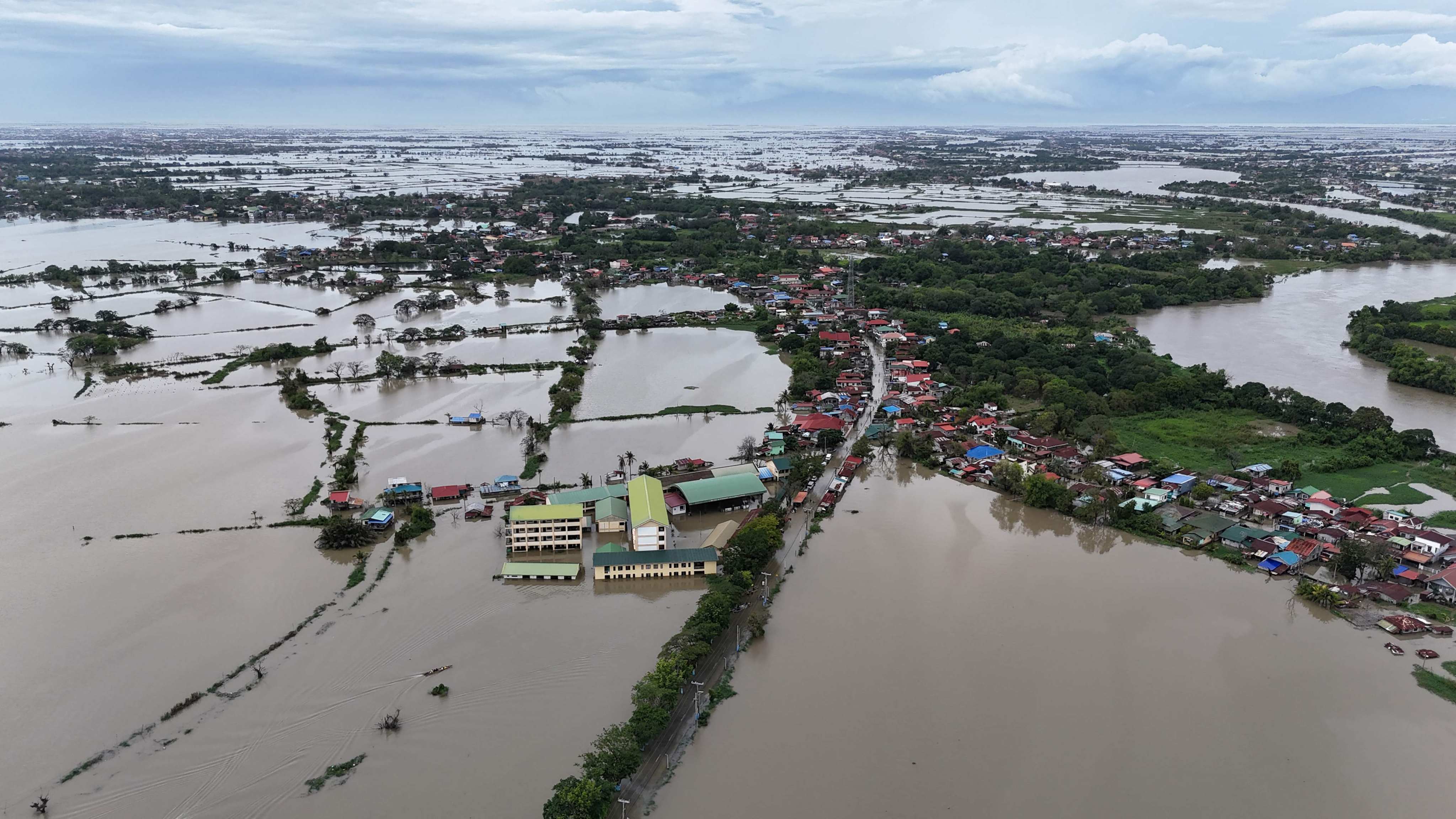 Flooded villages in Calumpit, Bulacan province, north of Manila, last month, after a river overflowed due to heavy rains brought about by Typhoon Co-May. Photo: AFP