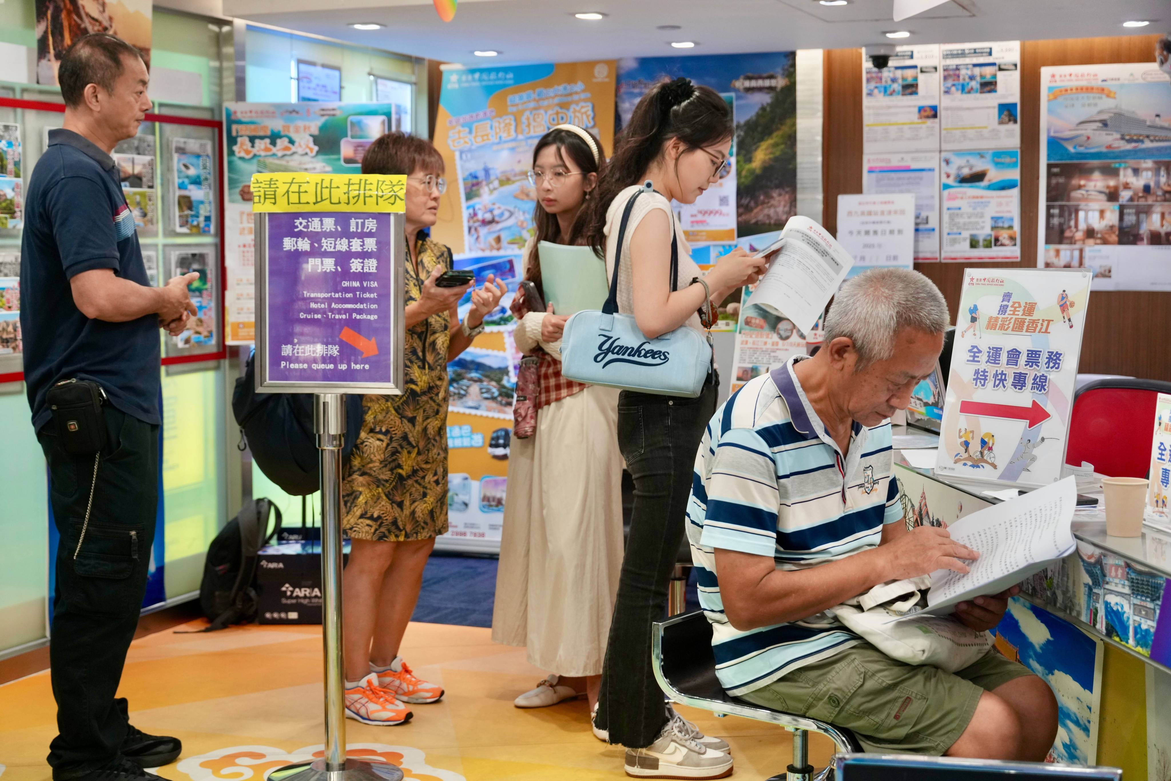 People buy tickets for the 15th National Games. Photo: Sam Tsang