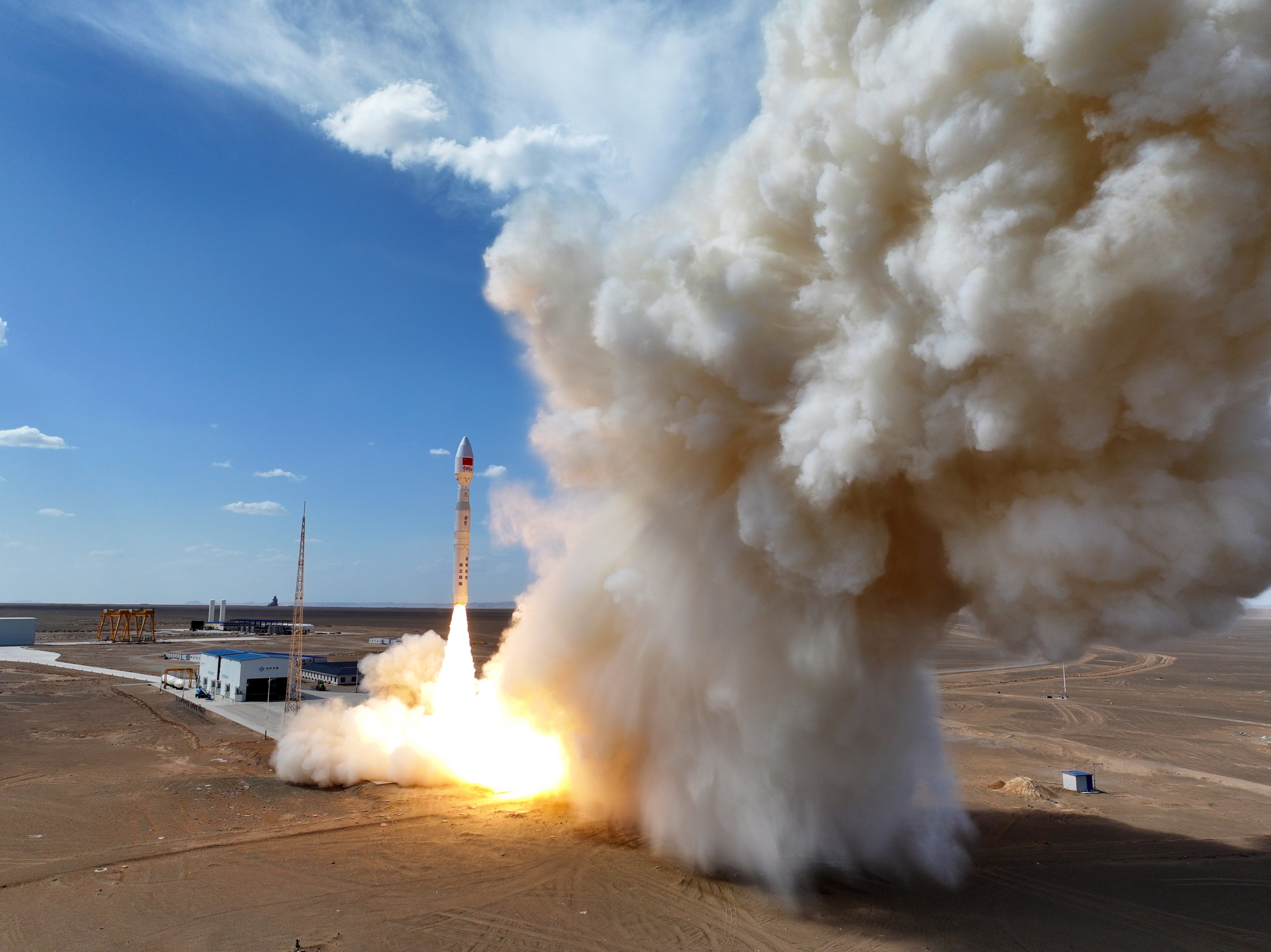 A rocket carrying seven satellites blasts off from a commercial launch site in northwest China on August 19. China has been stepping up launches of low-orbit satellites in recent months as it races to develop alternatives to SpaceX’s Starlink satellite internet network. Photo Xinhua