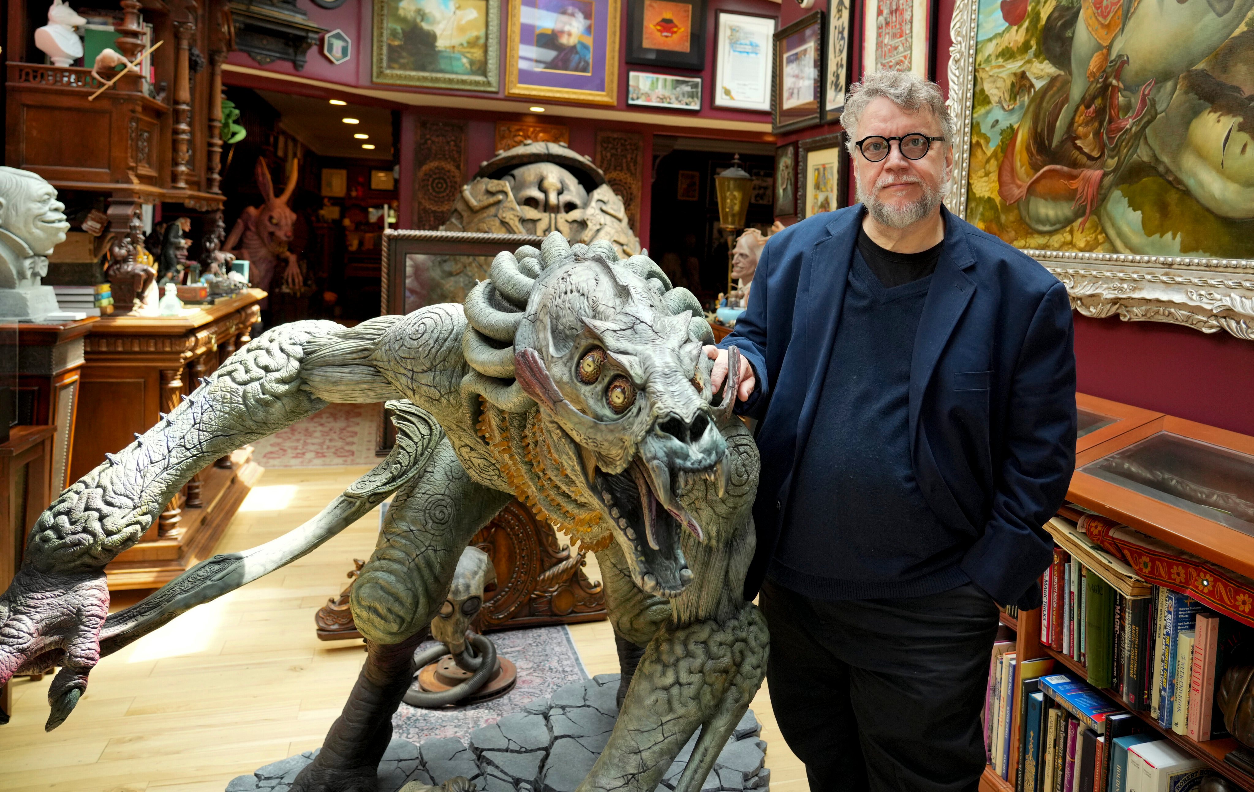 Guillermo del Toro poses for a photo at his “Bleak House”, which houses his lifelong collection of horror memorabilia, in Santa Monica, California. Photo: AP