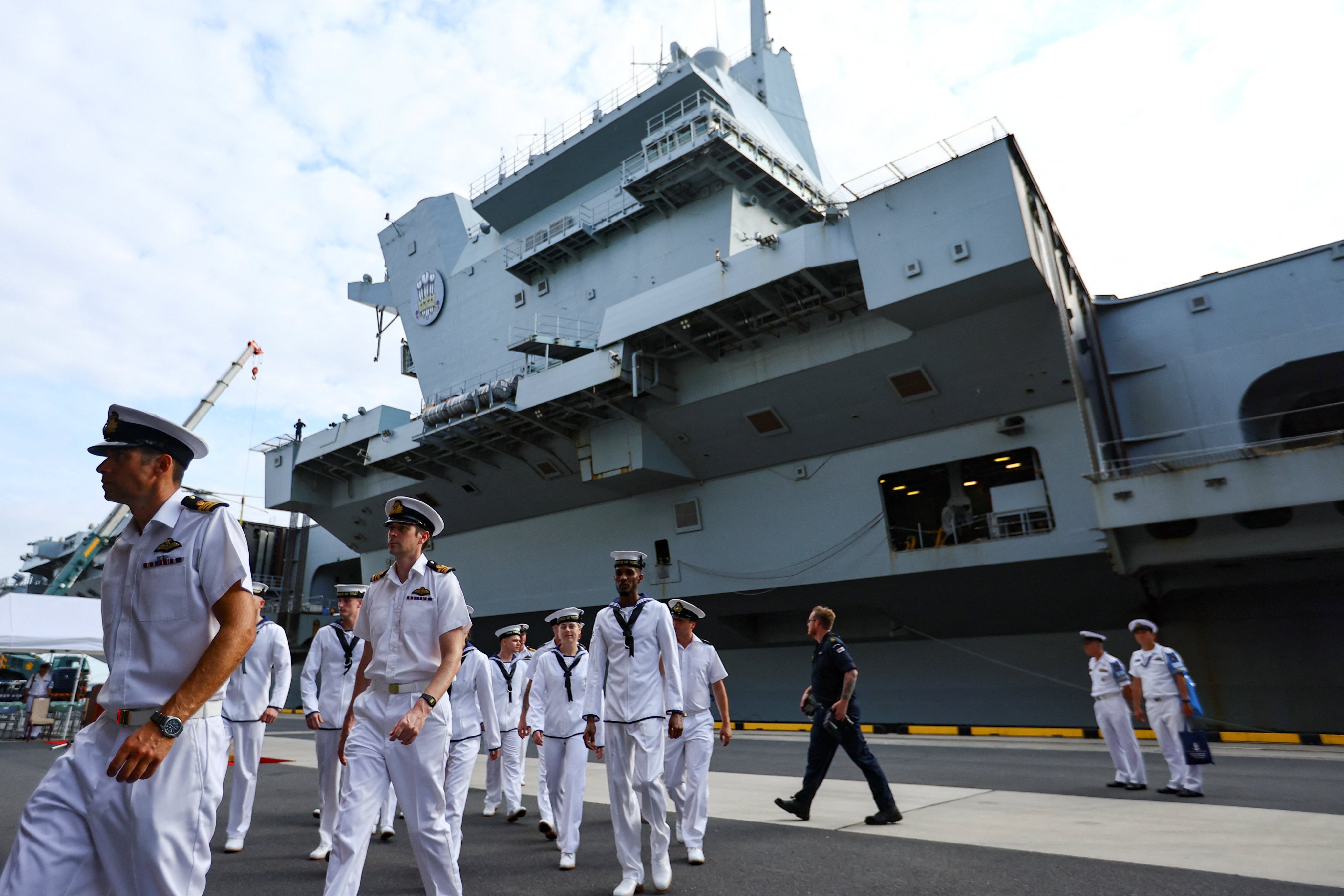 Royal Navy sailors disembark from Britain’s HMS Prince of Wales aircraft carrier  upon arrival in Tokyo on Thursday. Photo: Reuters