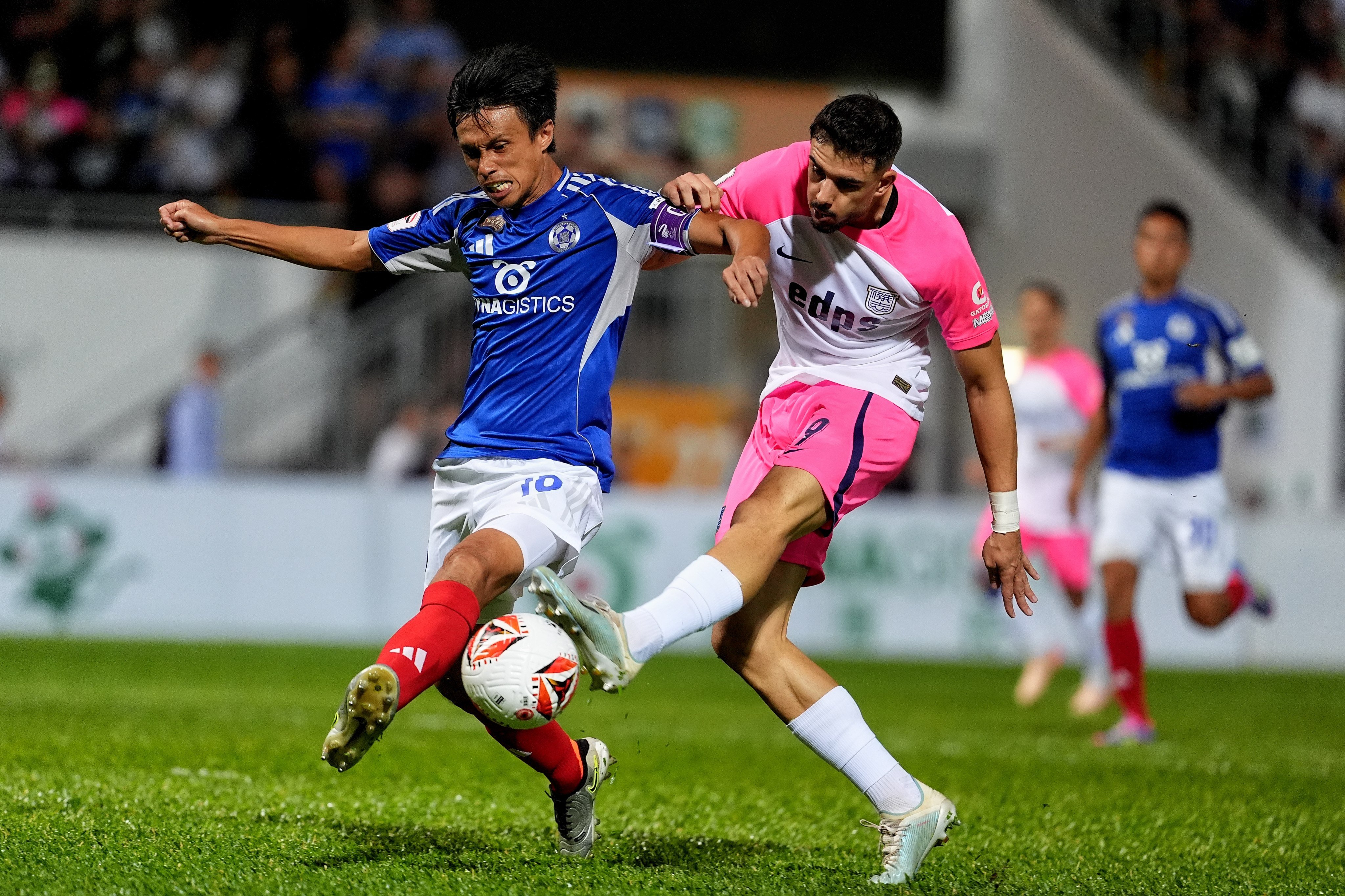Adrian Revilla is thwarted by Eastern defender Leung Chun-pong. Photo: Elson Li