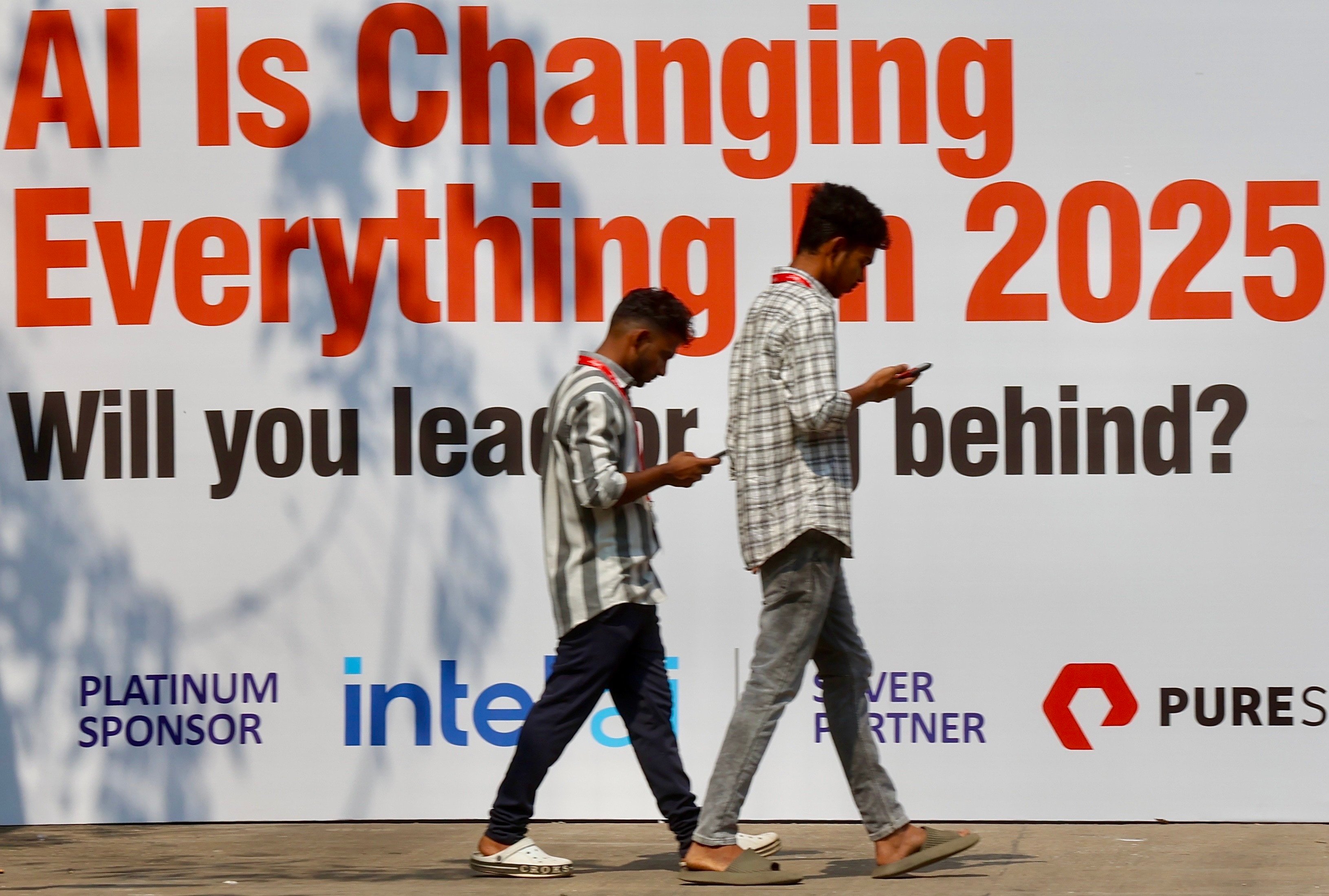 Software professionals arrive to attend an artificial intelligence conference in Bangalore in March. Industry experts have hailed the plan by OpenAI to launch its first office in India. Photo: EPA-EFE