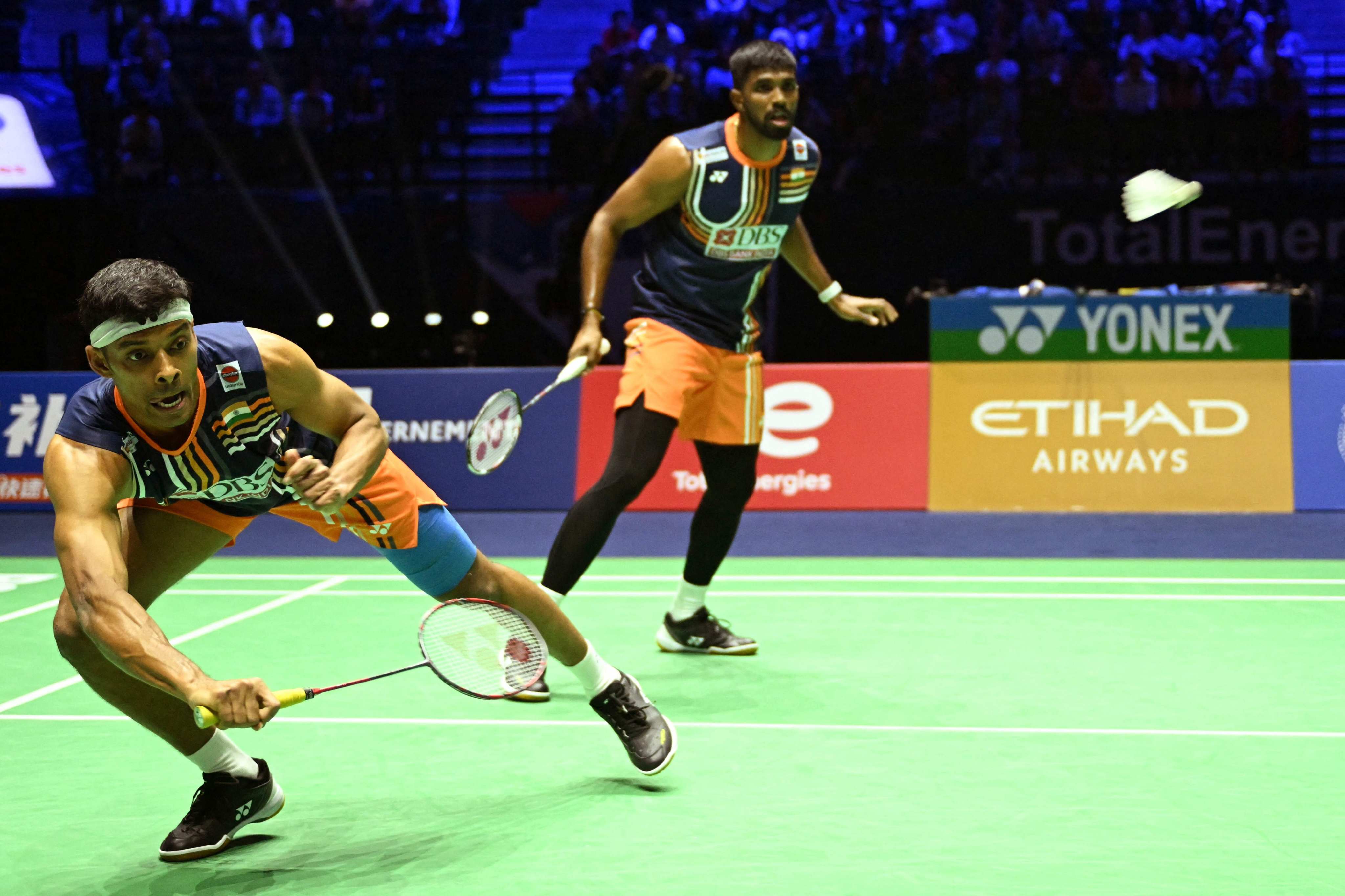 India duo Satwiksairaj Rankireddy and Chirag Shetty (left) watch on as the shuttlecock flies over the net. Photo: AFP