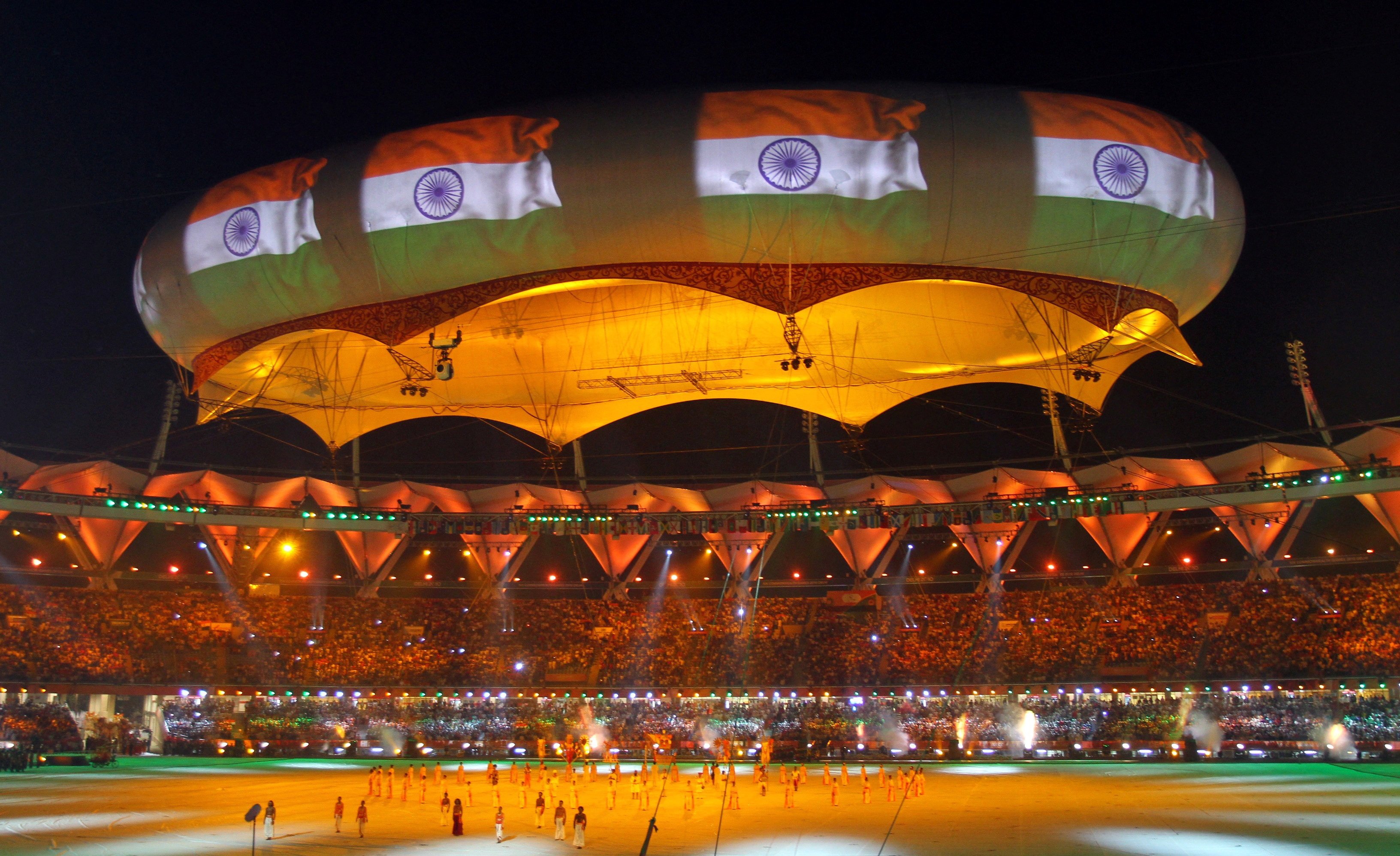 The Indian national flag is projected onto a balloon during the Commonwealth Games closing ceremony at the Jawaharlal Nehru stadium in New Delhi October 14, 2010. Photo: Reuters