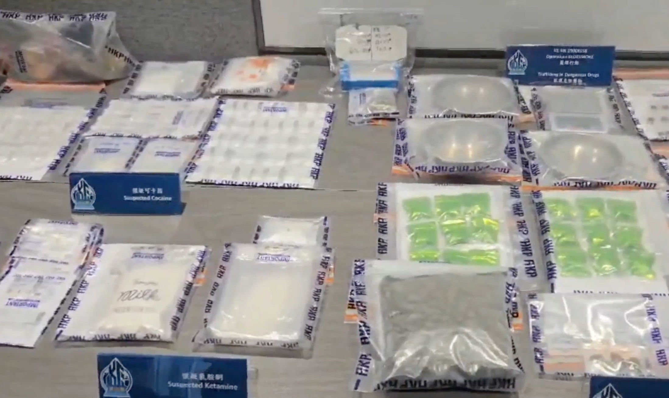 Hong Kong police display various suspected drugs seized in a recent case. Photo: Handout