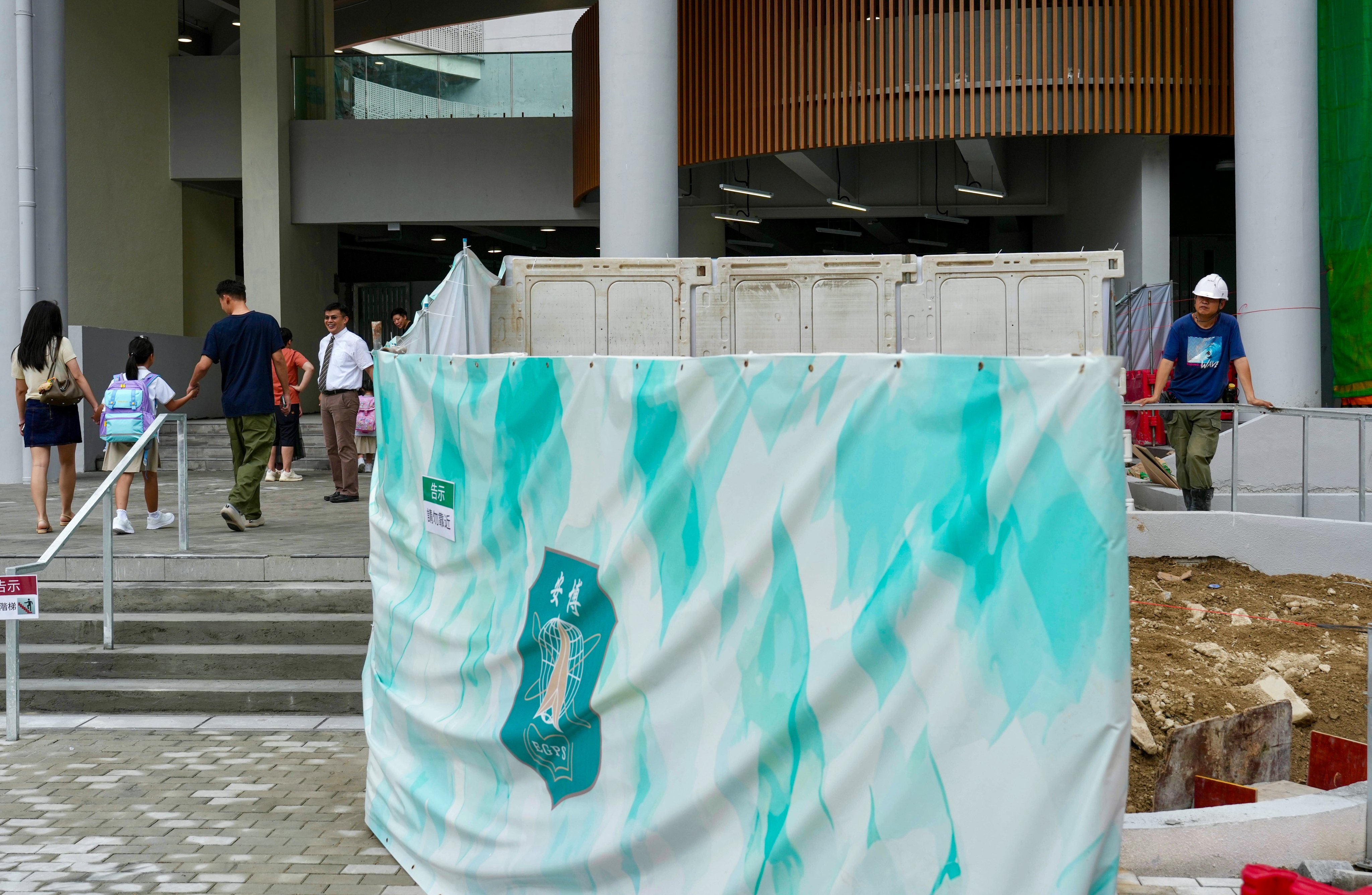 Students head to Erudite Government Primary School for the first day of the new academic year. Photo: Sam Tsang