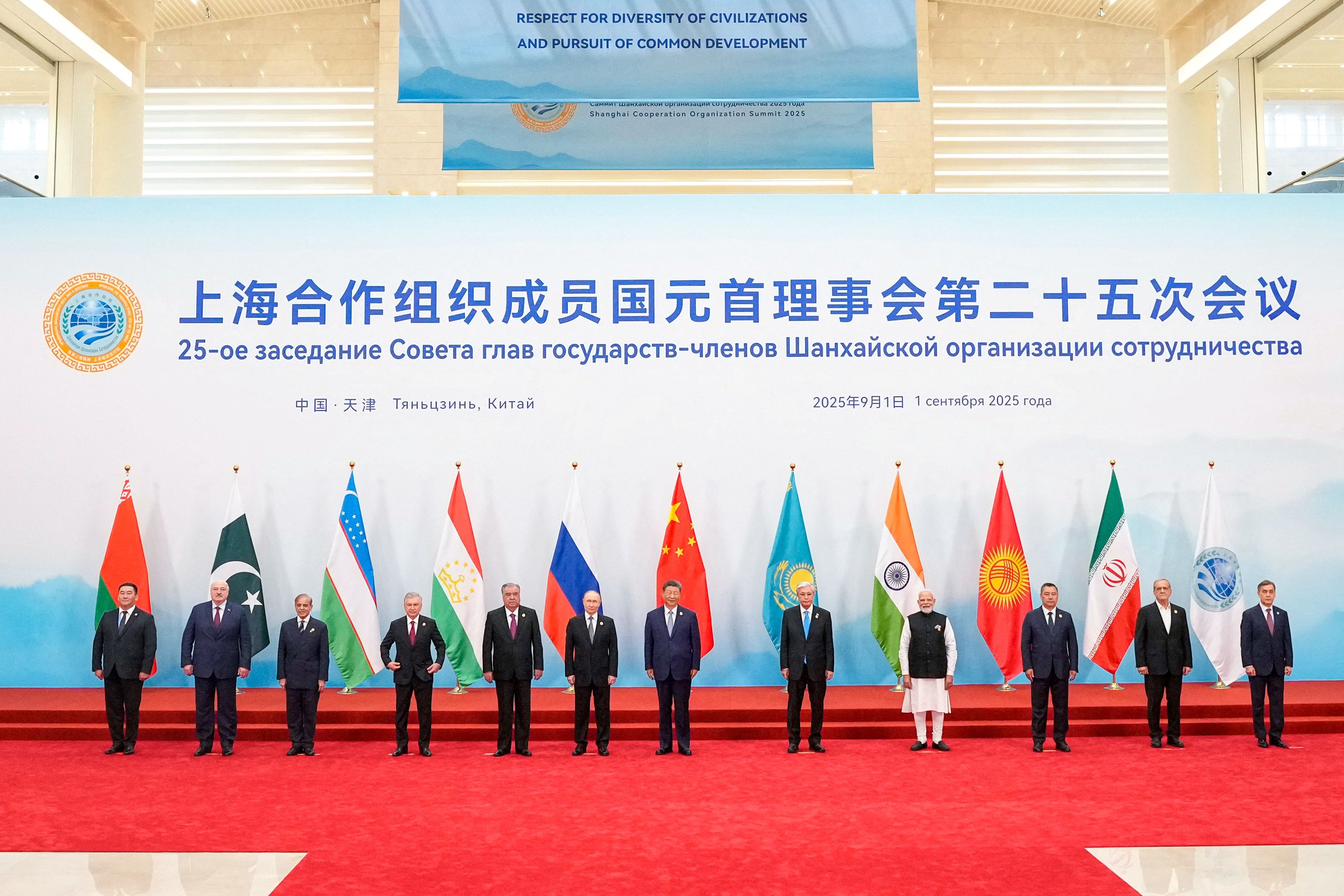 Chinese President Xi Jinping (centre) with other leaders and SCO summit participants in Tianjin on Monday. Photo: AFP
