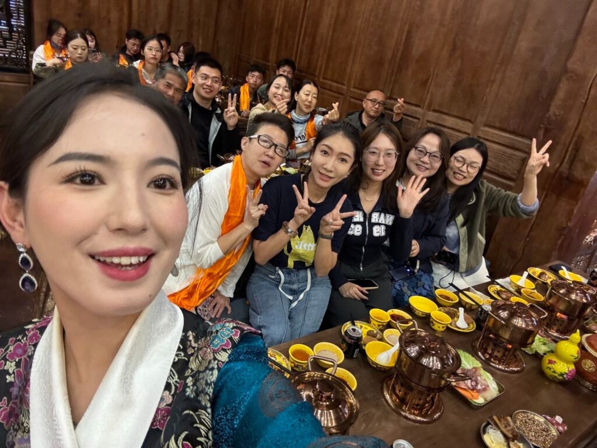 Yongzong, who tries to meet every request for photographs, poses with some happy fans. Photo: Handout
