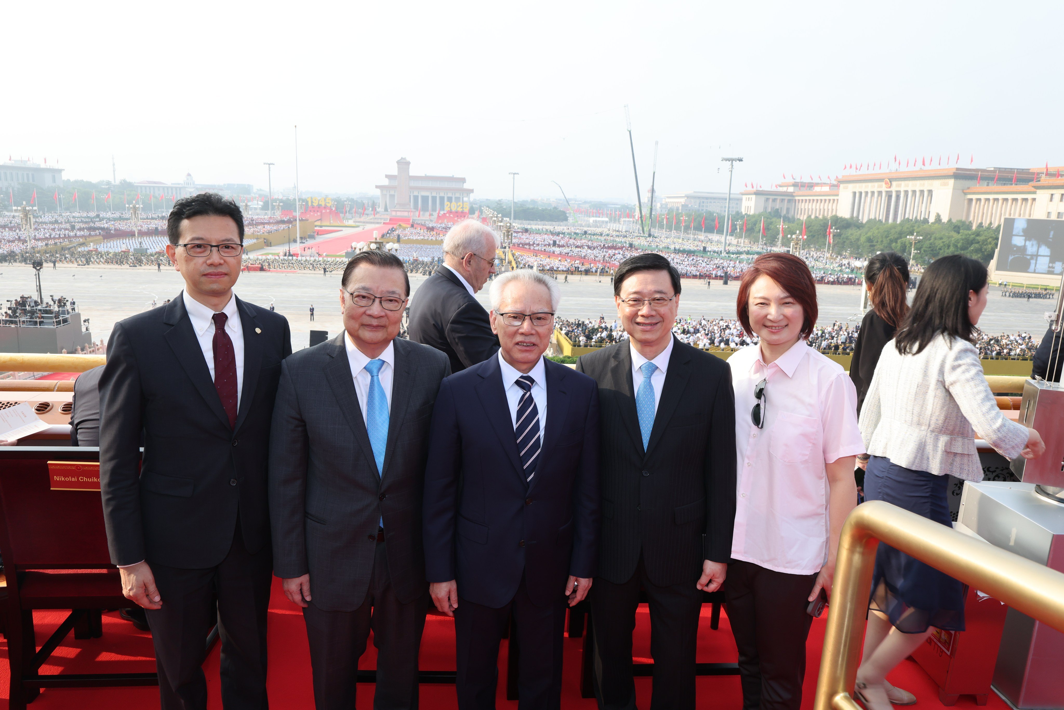 (From left) FTU chief Stanley Ng Chau-pei, veteran politician Tam Yiu-chung, Macau leader Sam Hou-fai, John Lee and Starry Lee in Tiananmen Square ahead of Wednesday’s military parade. Photo: CFP