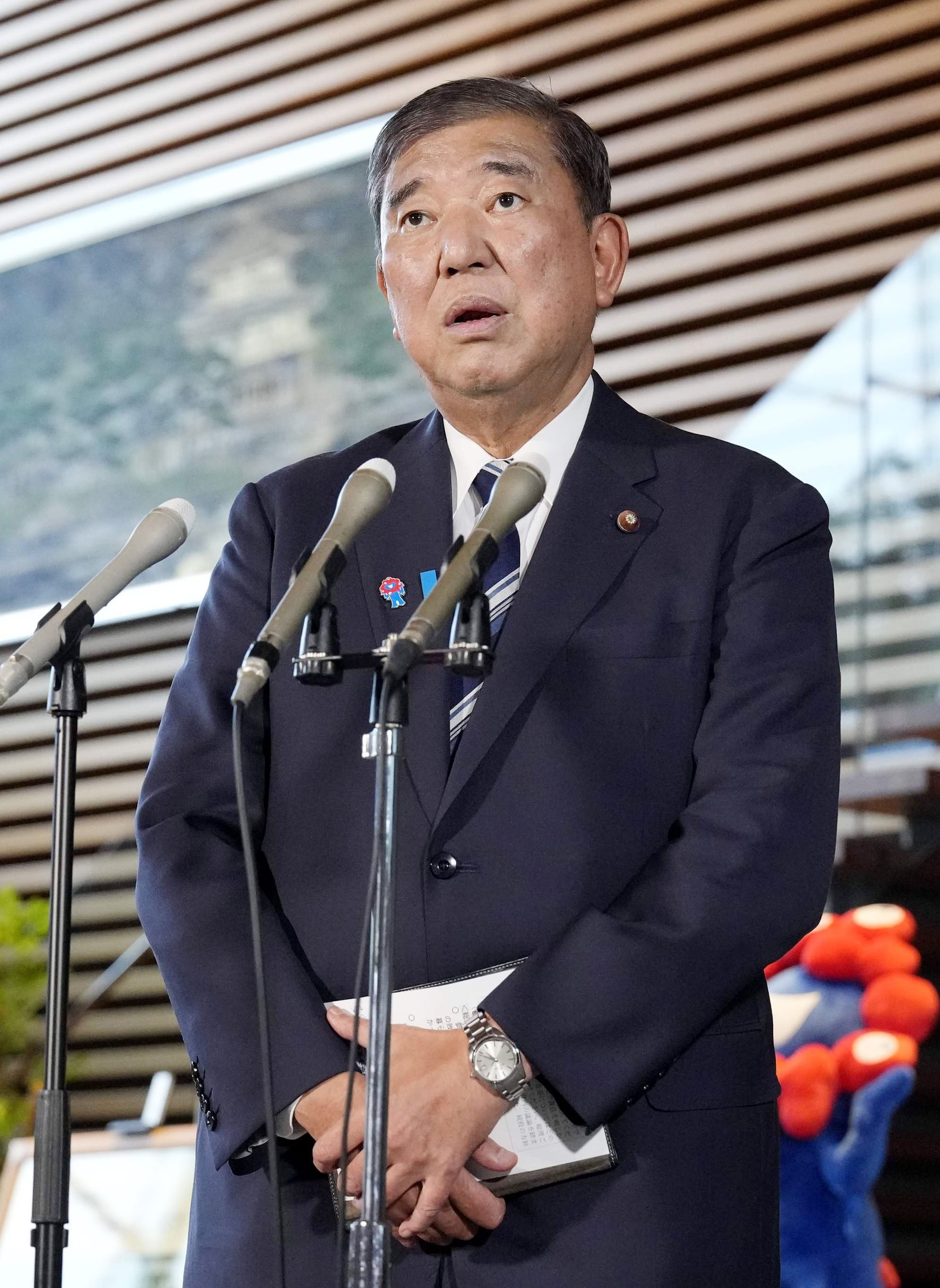 Japanese Prime Minister Shigeru Ishiba meets the press at his office in Tokyo on Tuesday. Ishiba is facing pressing to resign after his Liberal Democratic Party lost two recent national elections. Photo: Kyodo