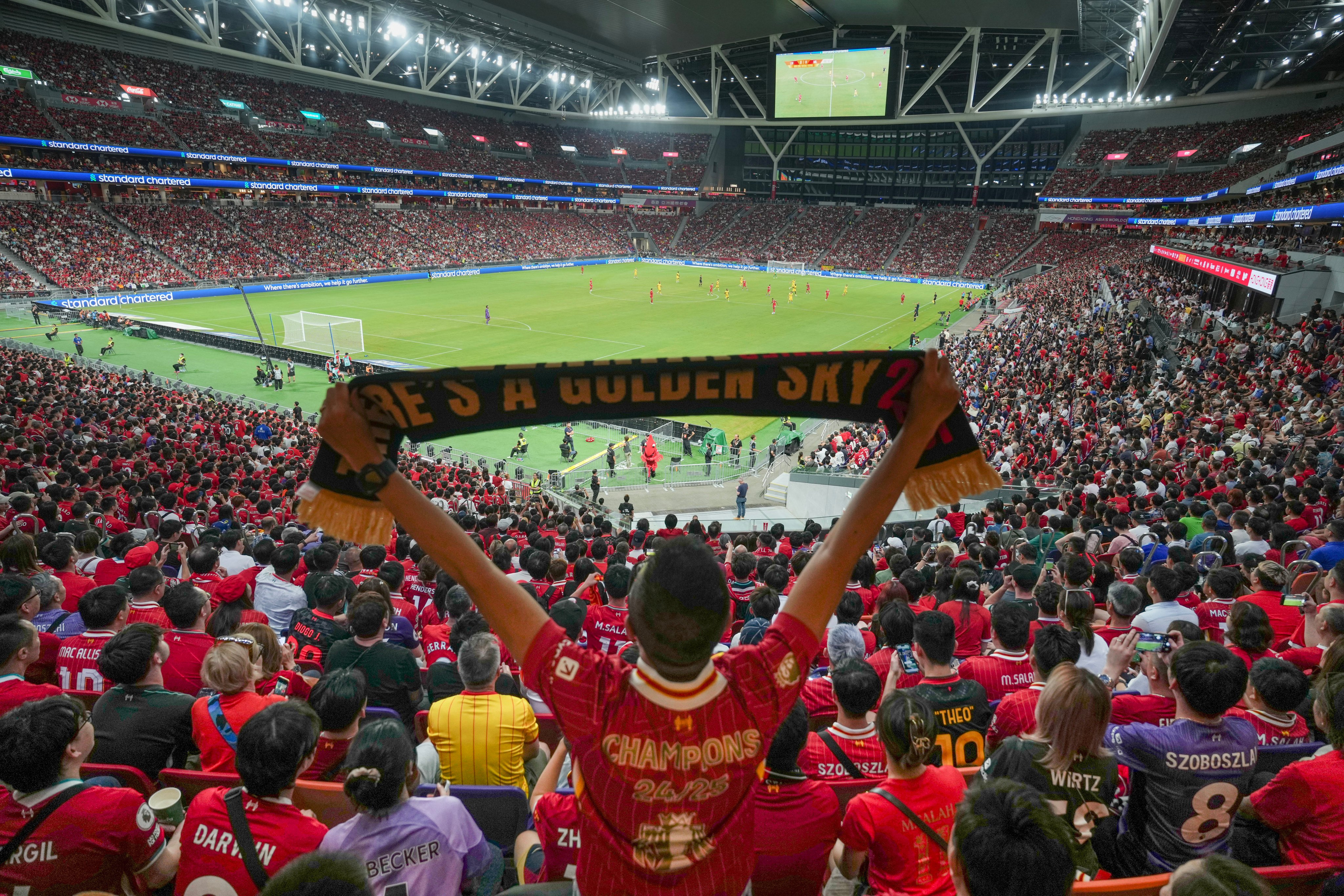 Liverpool fans watch their club’s match against AC Milan during the Hong Kong Football Festival at Kai Tak Stadium. Photo: Sam Tsang