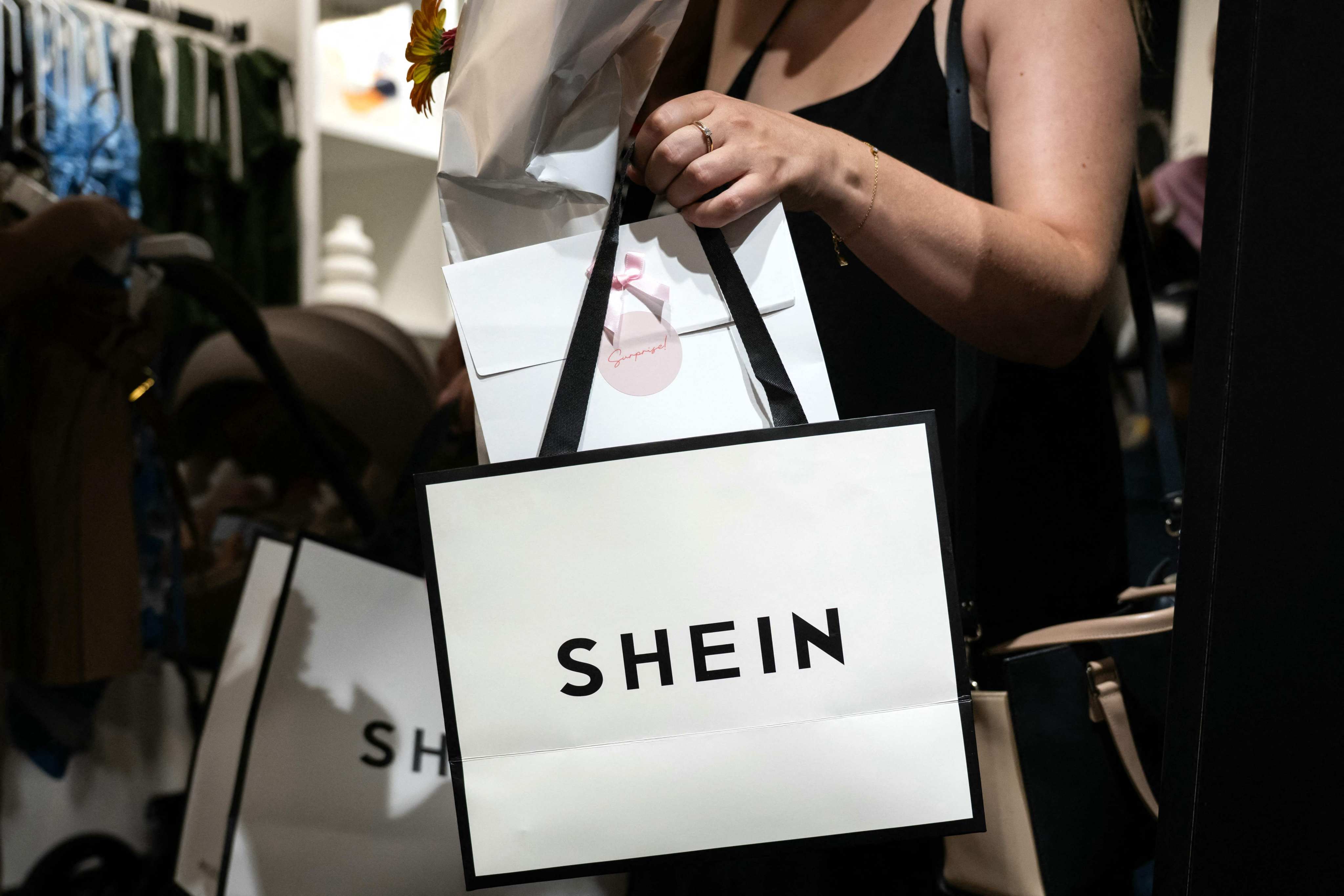 Shein bags seen at a pop-up store in Dijon, France. Photo: AFP