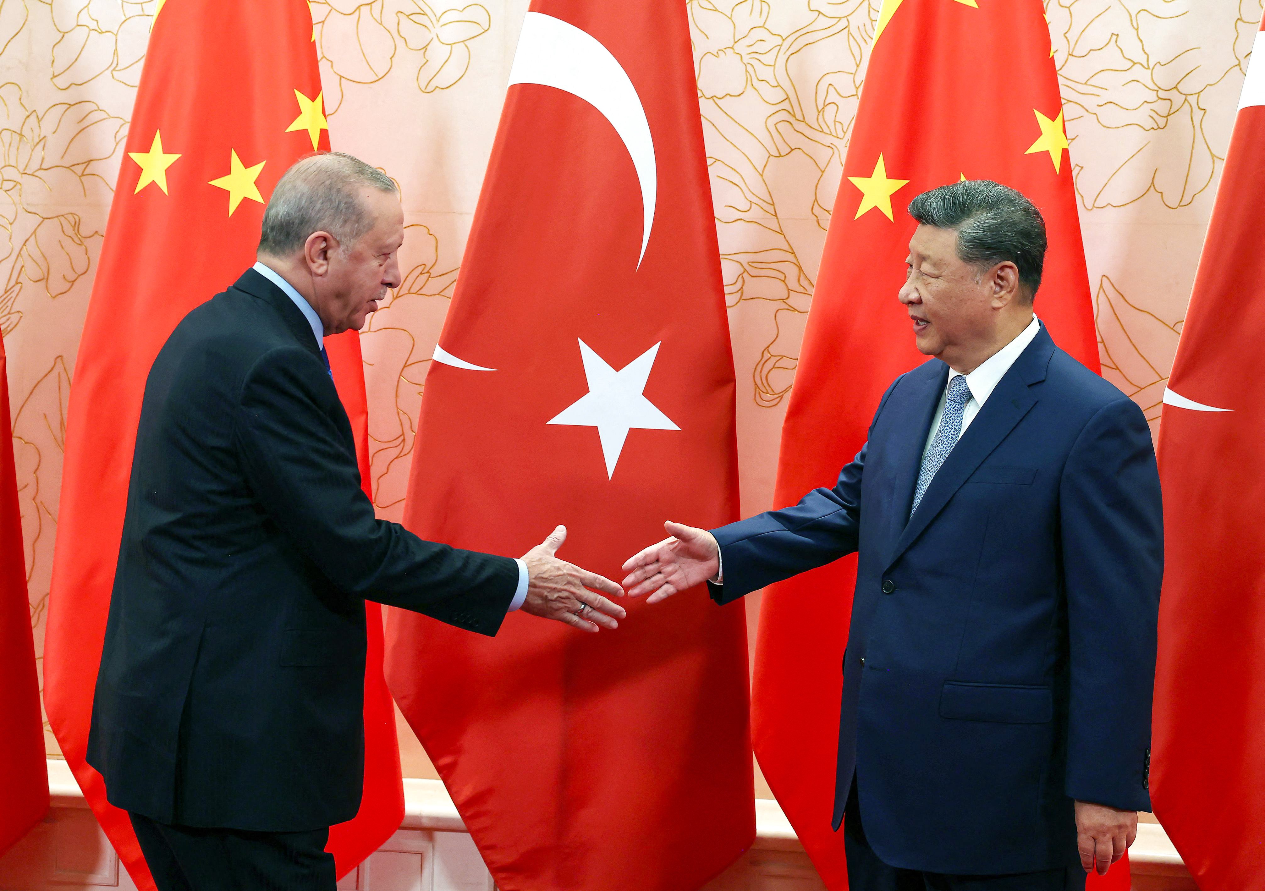 Turkish President Recep Tayyip Erdogan (left) shakes hands with Chinese President Xi Jinping during the Shanghai Cooperation Organisation summit in Tianjin this week. Erdogan was one of several leaders Xi met during bilateral talks over the week. Photo:  Handout/Turkish Presidential Service/ AFP