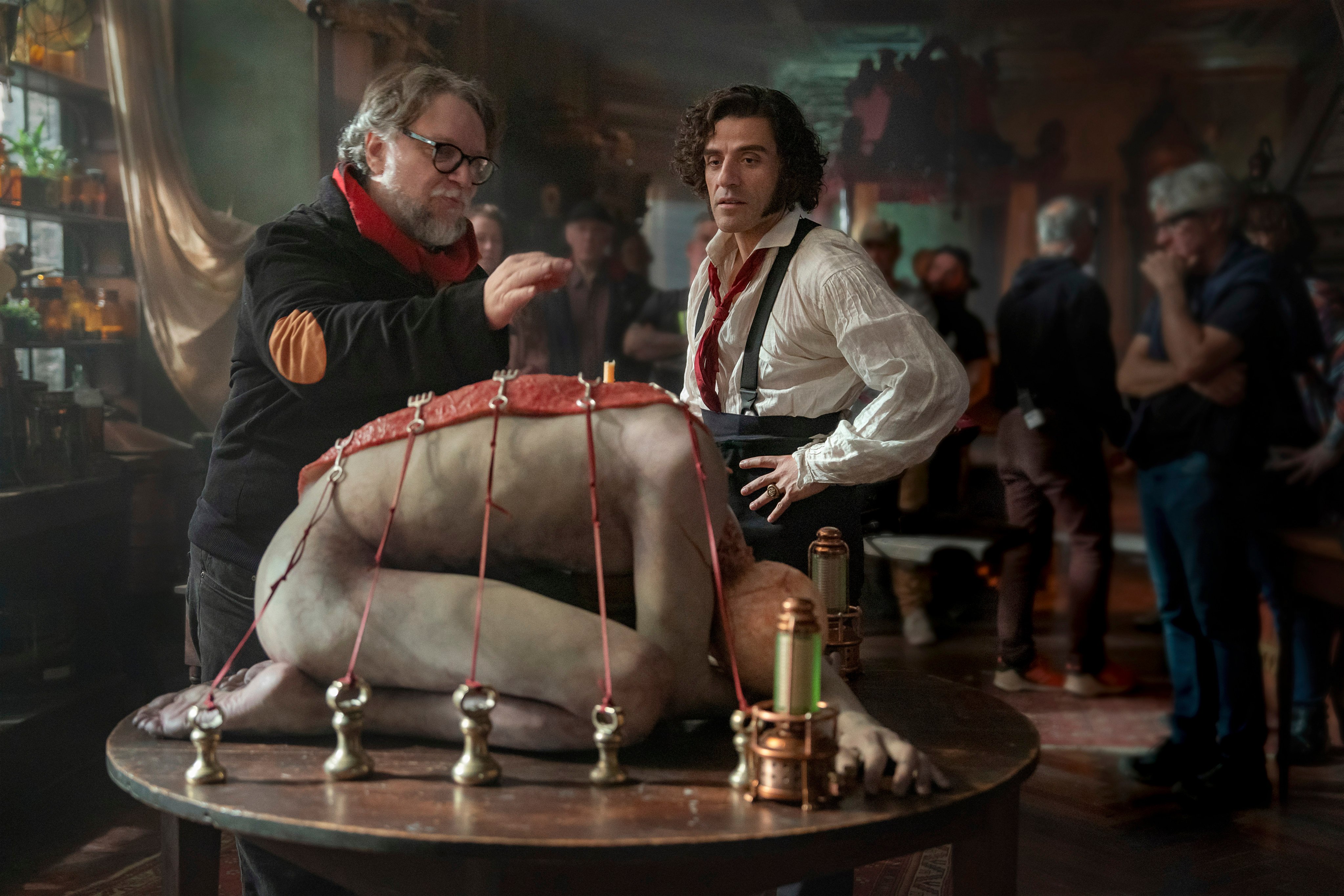 Director Guillermo del Toro (left) and Oscar Isaac on the set of Frankenstein (2025). Photo: AP