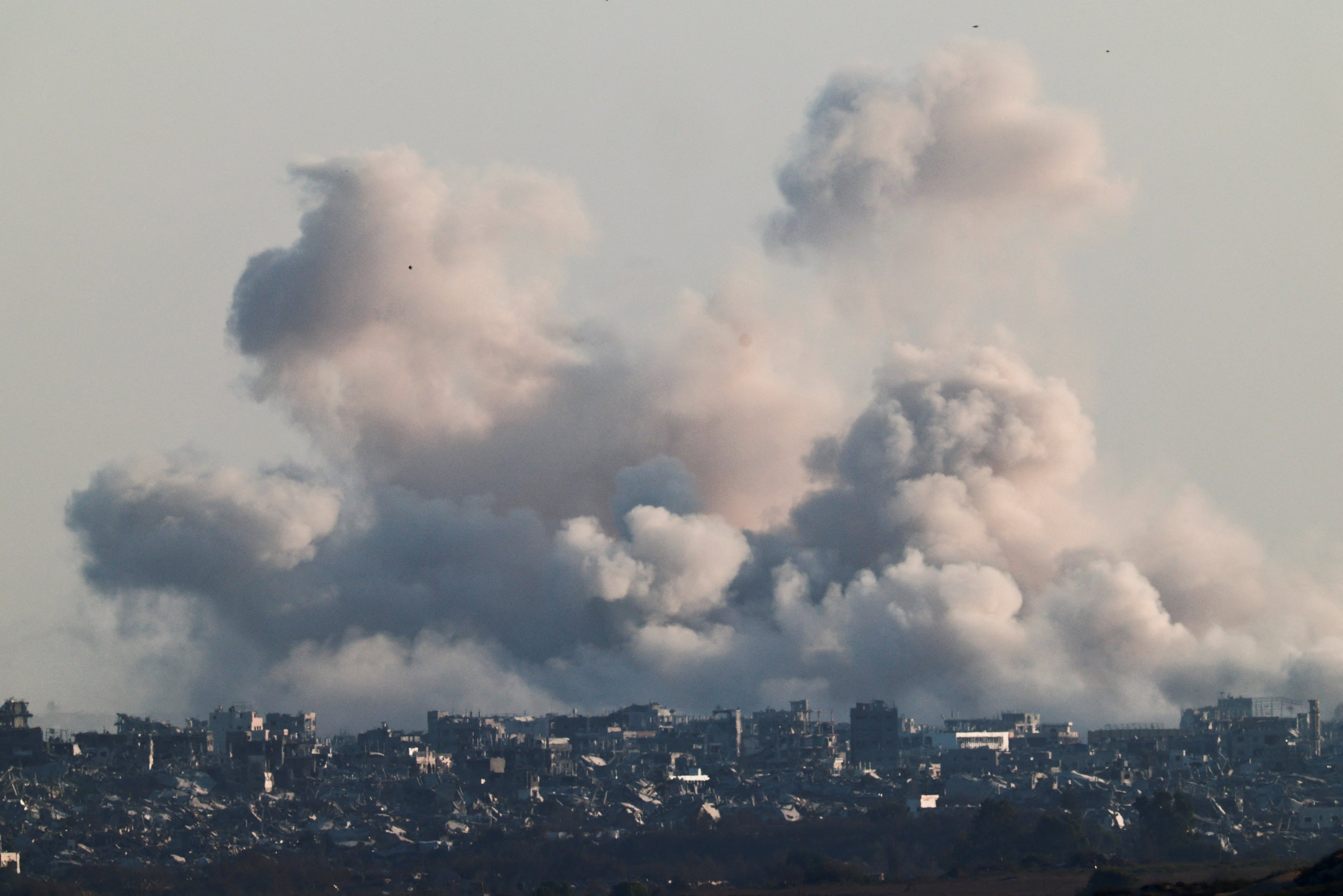 Smoke rises after an explosion in Gaza, as seen from the Israeli side of the border on Thursday. Photo: Reuters