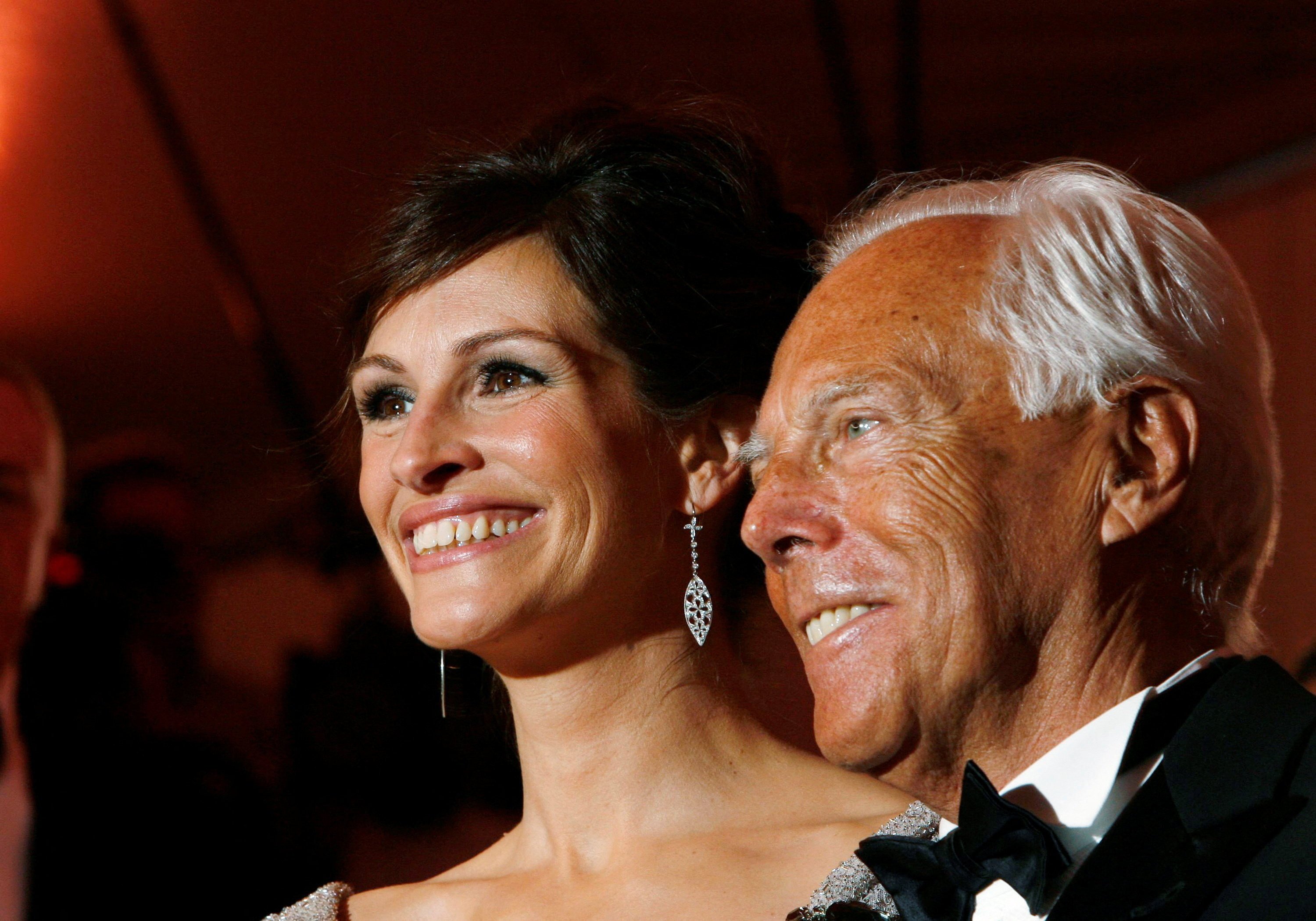 Julia Roberts, dressed in Giorgio Armani, posing with designer Giorgio Armani at the Met Gala in 2008. Armani just passed away at the age of 91. Photo: Reuters