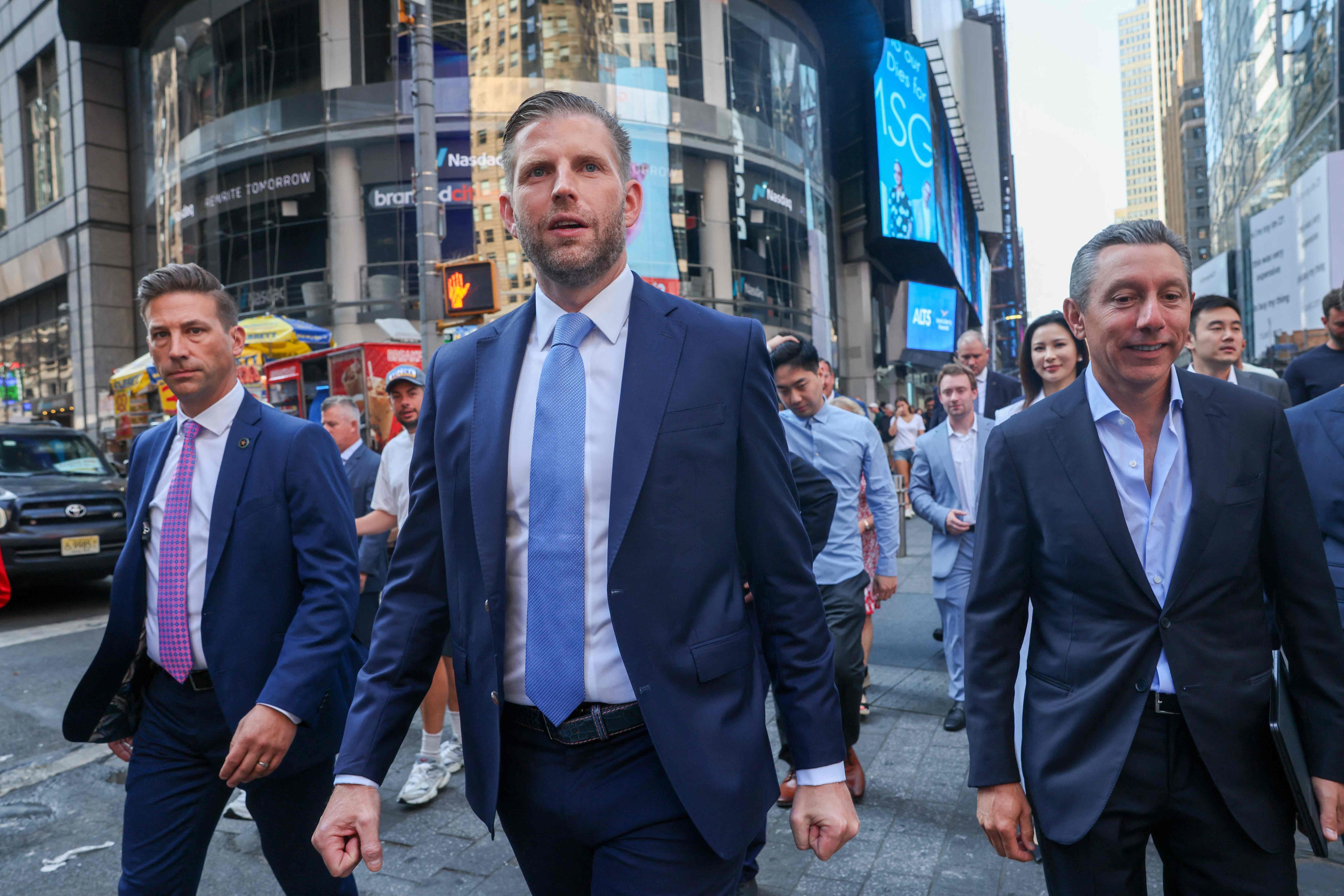Eric Trump, a board  director of World Liberty Financial, walks outside Nasdaq in Times Square, New York City, on August 13, 2025. Photo: Getty Images via AFP