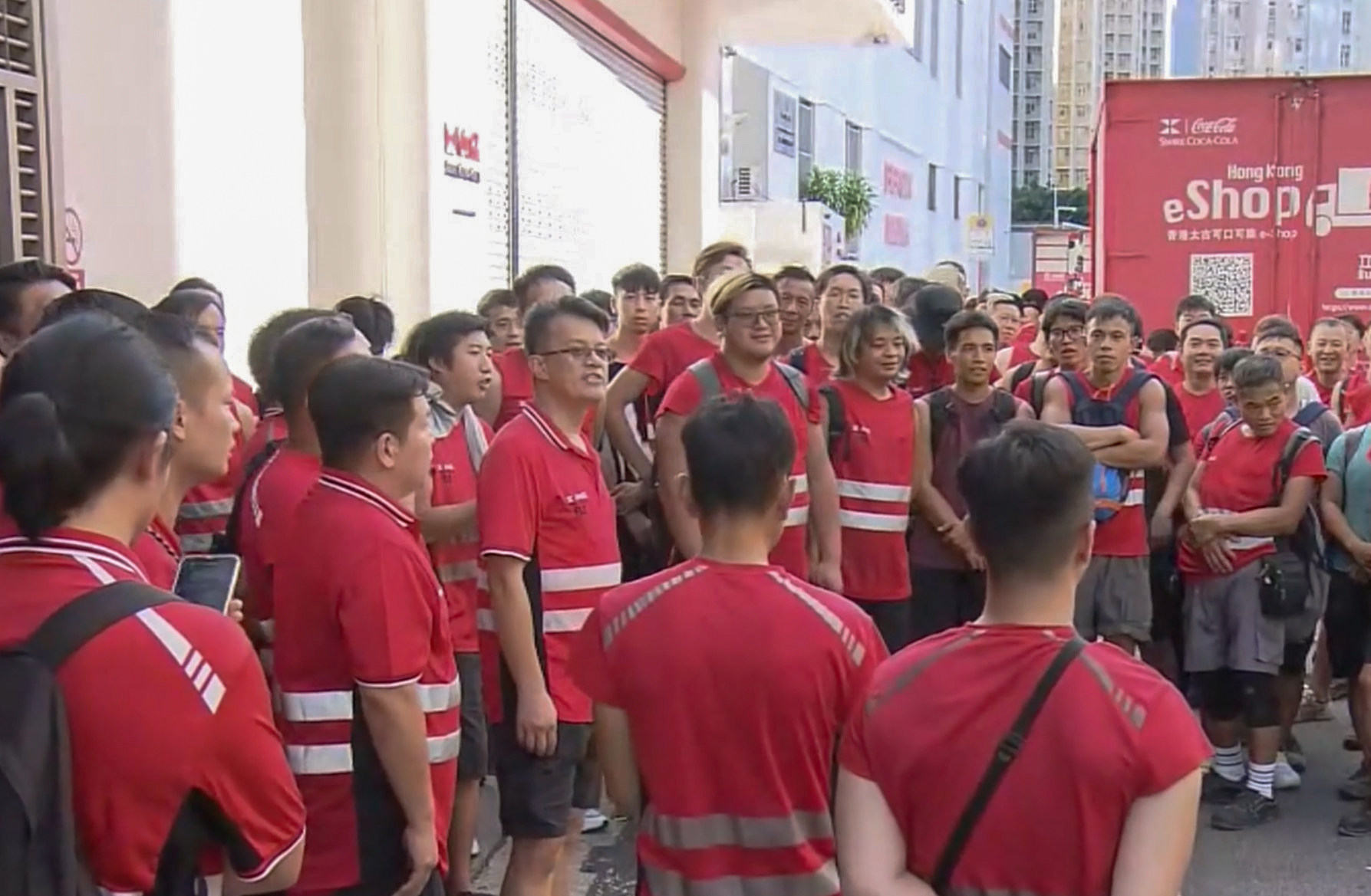 A screengrab of footage of Swire Coca Cola workers staging a strike in Sha Tin. Photo: NowTV News