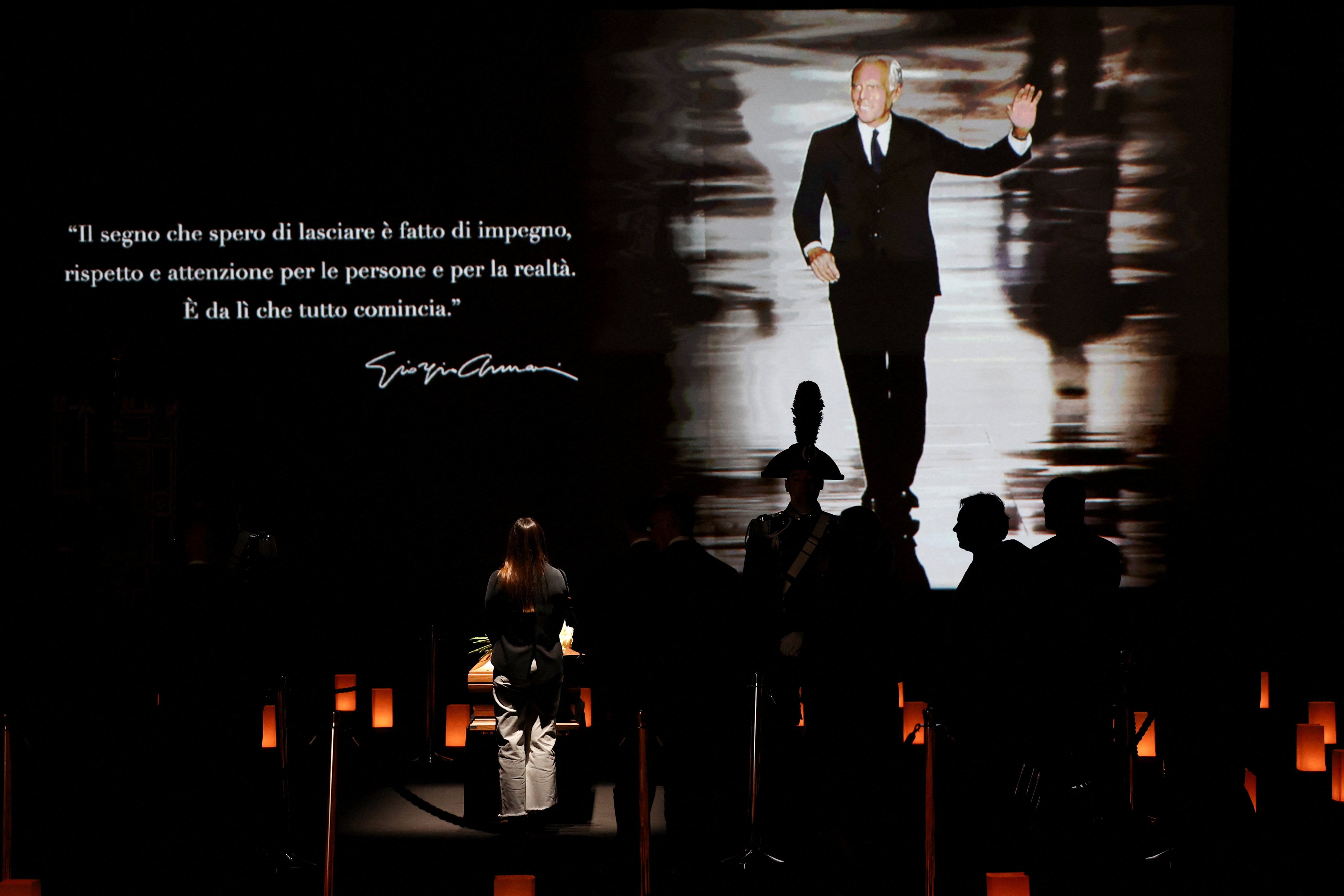 People pay tribute as designer Giorgio Armani lies in state at the Armani/Teatro, following his death at the age of 91, in Milan, Italy, on Saturday. Photo: Reuters