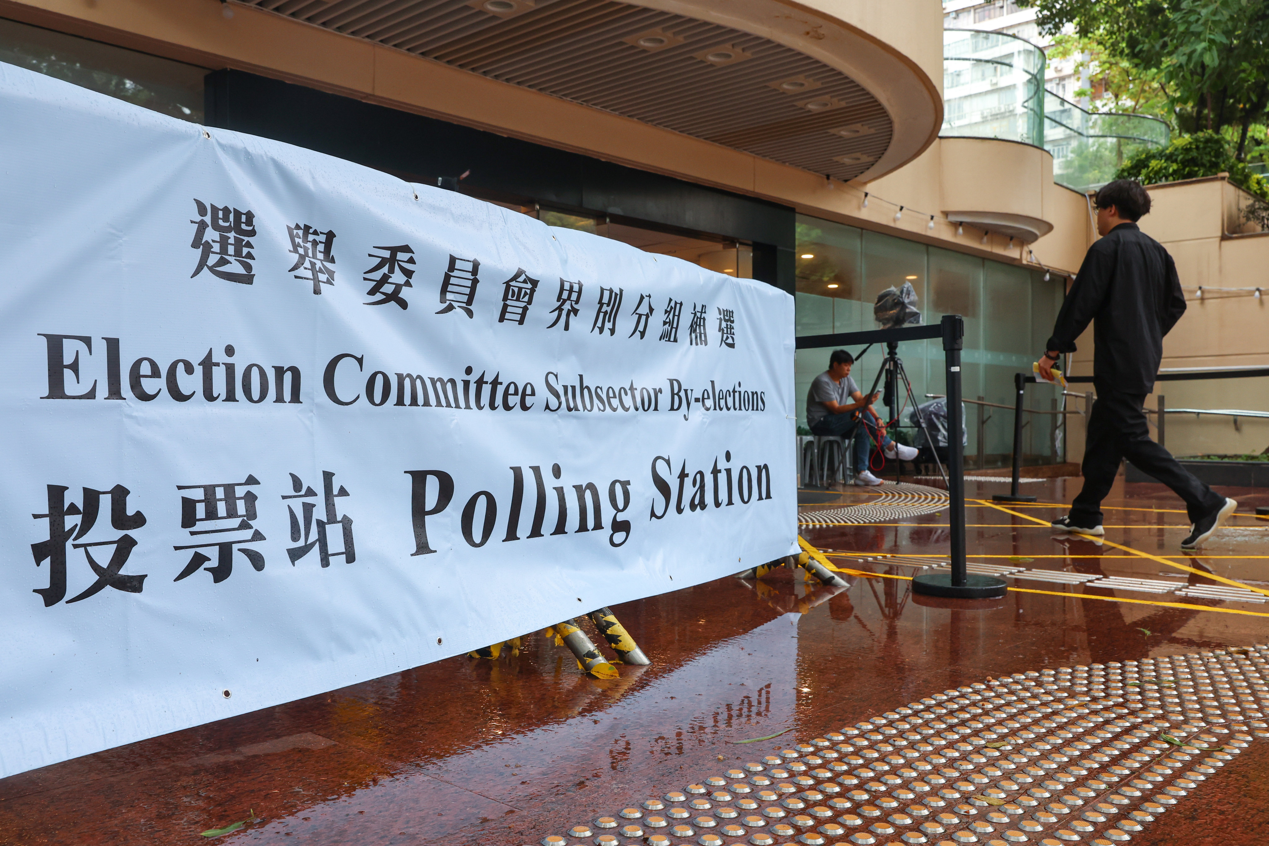A by-election to select members of the committee responsible for appointing the city’s leader proceeded as scheduled despite a T3 warning signal being issued on Sunday. Edmond So