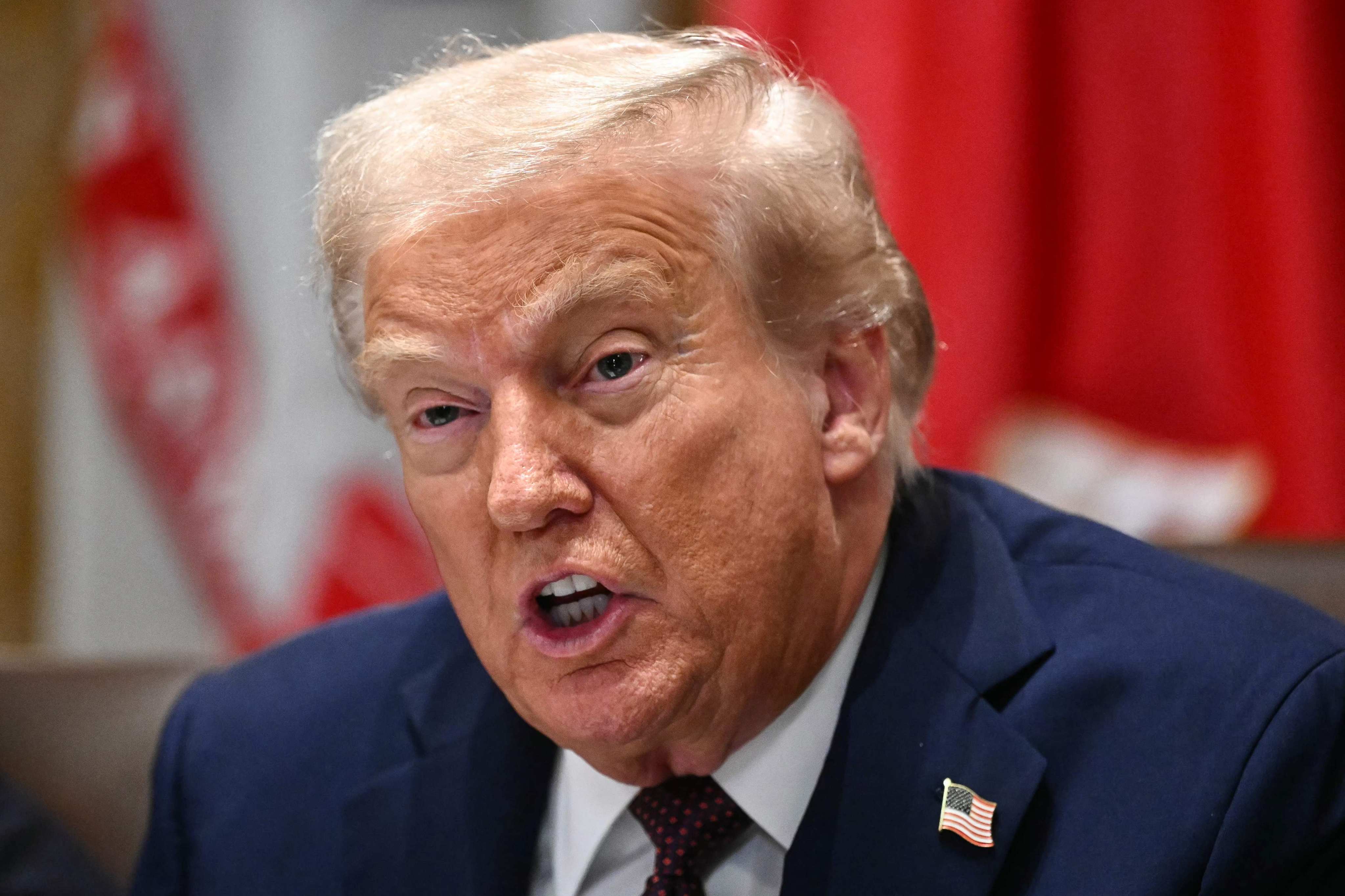 US President Donald Trump speaks during a cabinet meeting in the White House on August 26. Photo: AFP