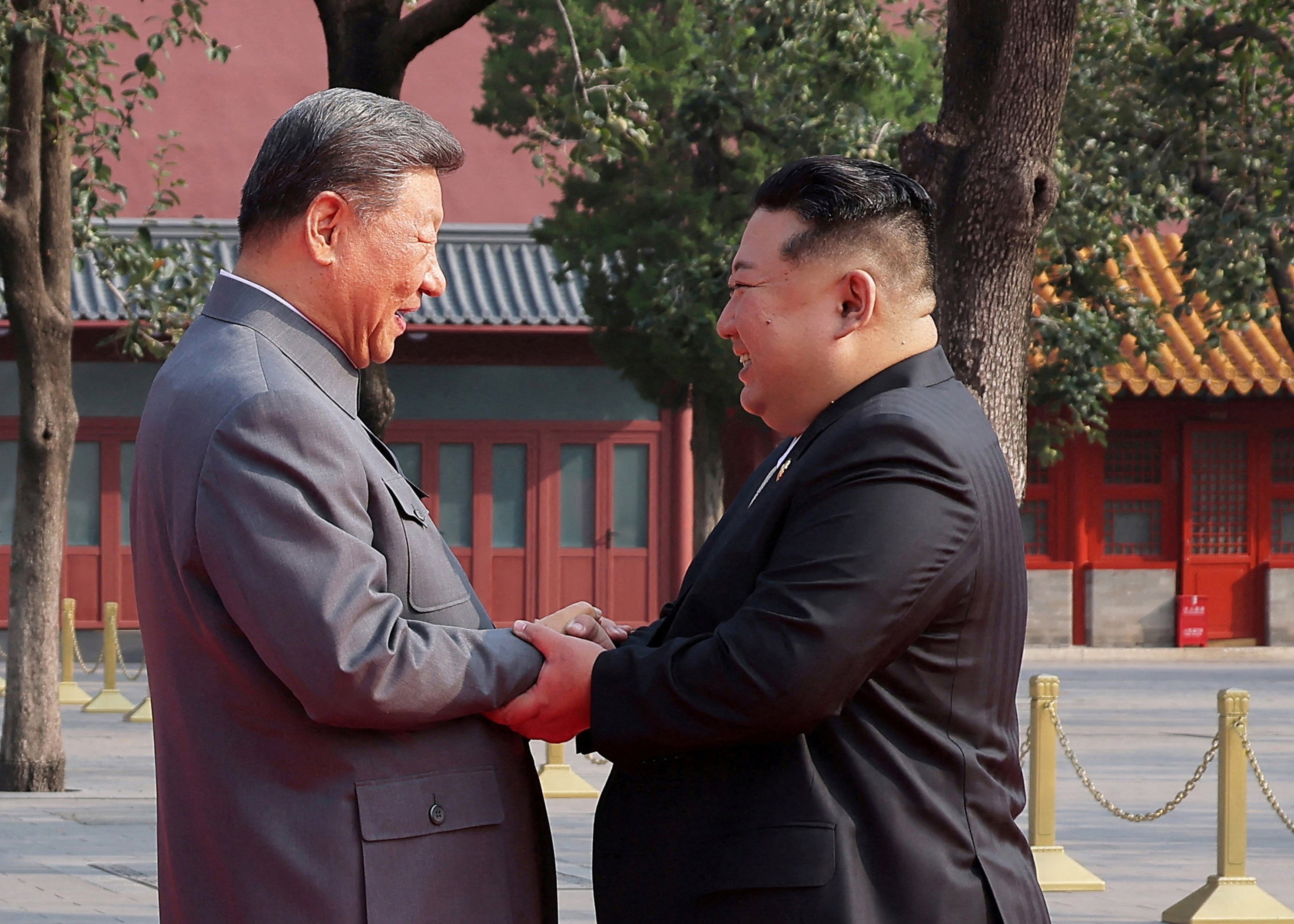 North Korean leader Kim Jong Un shakes hands with Chinese President Xi Jinping as they attend a military parade marking the 80th anniversary of the end of World War Two, in Beijing on September 4, 2025. Photo: Reuters