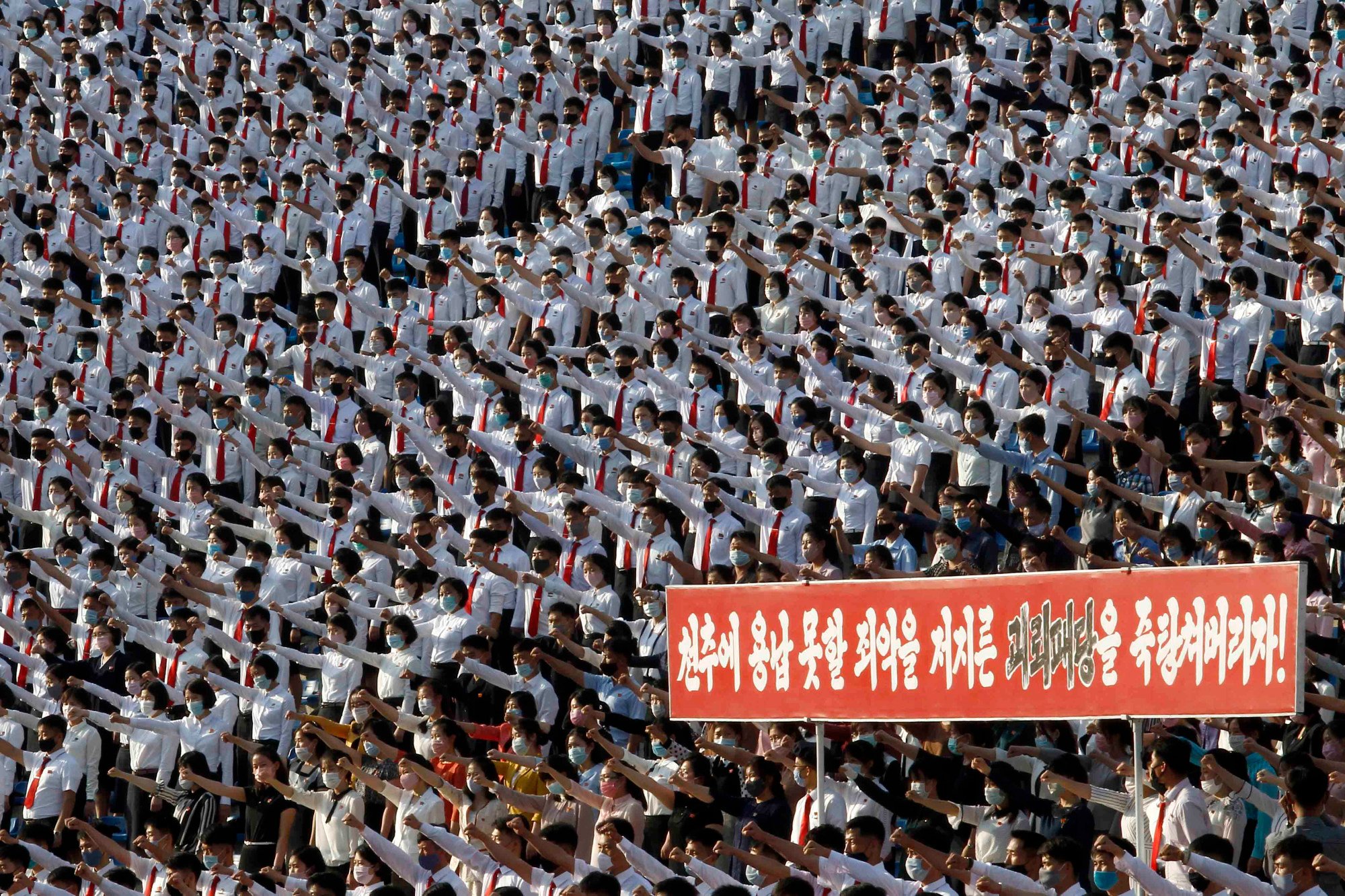 North Korean students stage a rally denouncing defectors in Pyongyang in 2020. Photo: AP