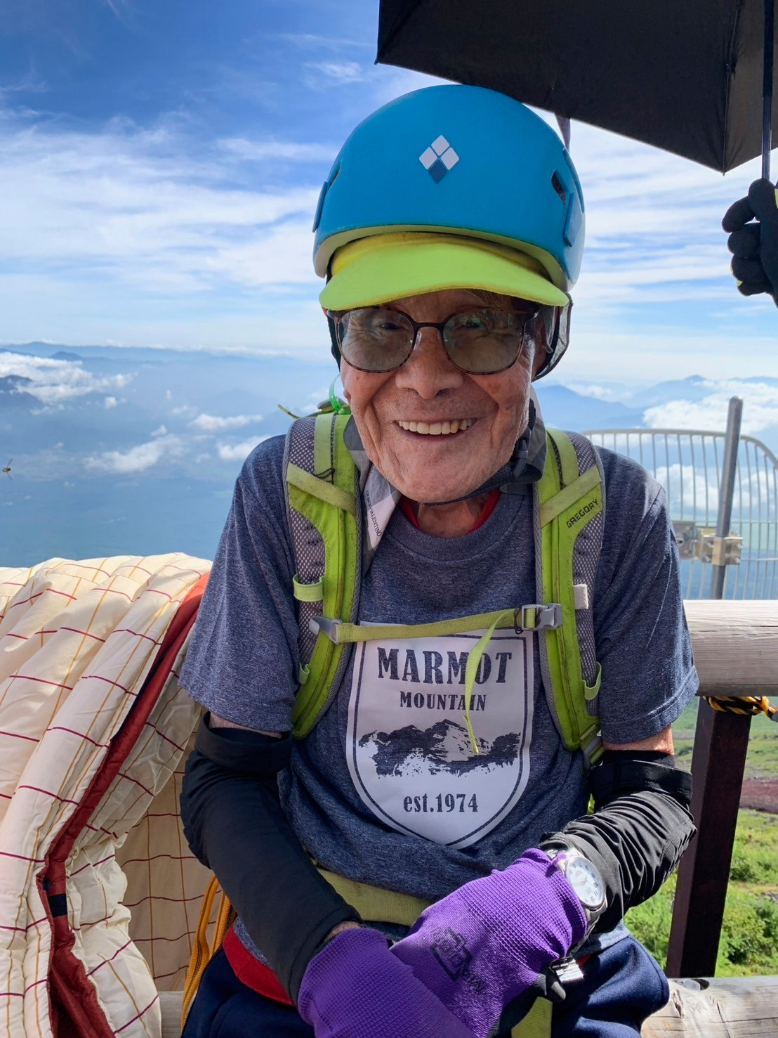 Kokichi Akuzawa smiles as he and his team of family and friends climb Mount Fuji, Japan’s highest mountain, on August 5, 2025. Photo: AP