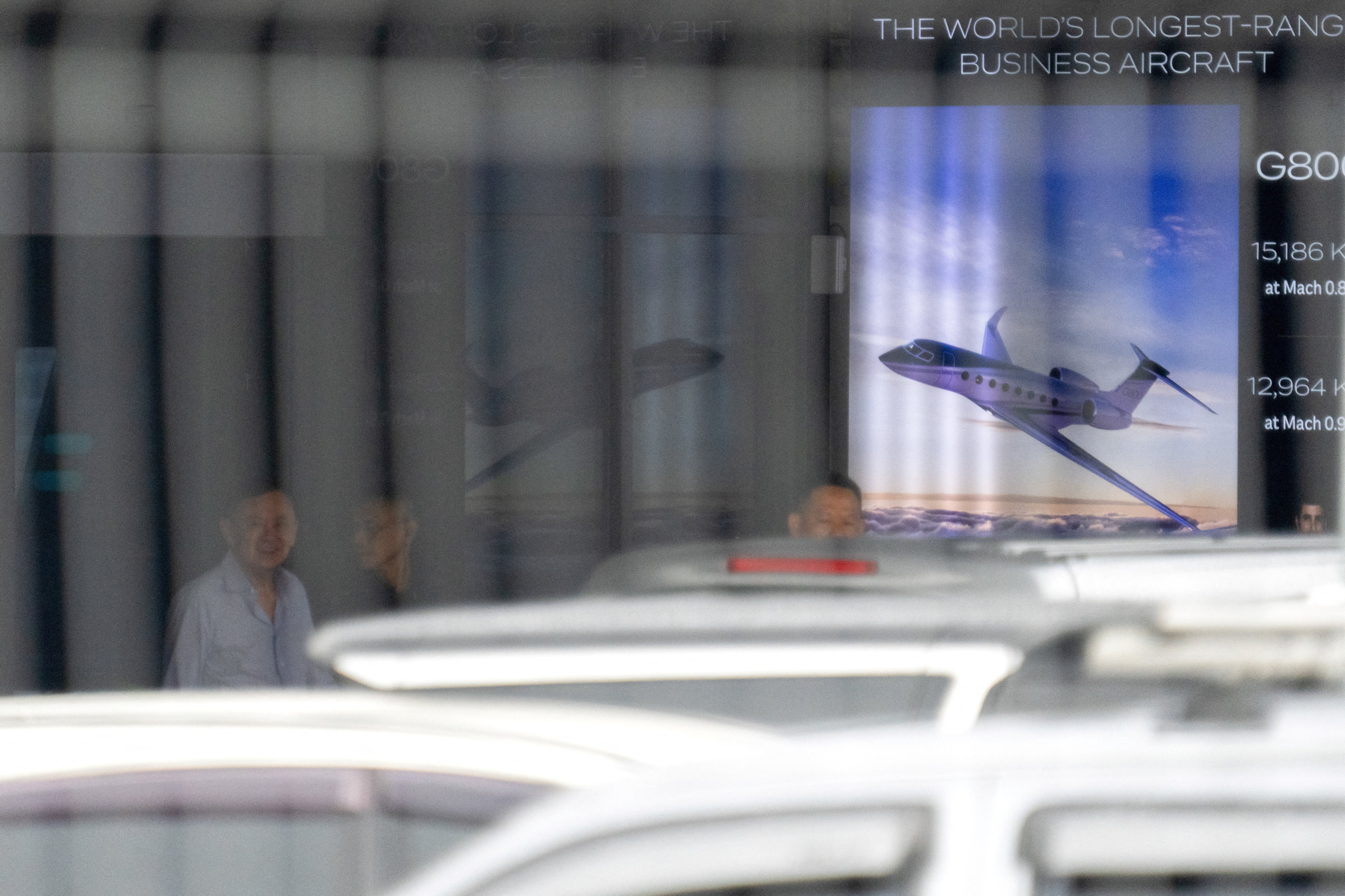 Thailand’s former prime minister Thaksin Shinawatra leaves after exiting a private jet terminal at Bangkok’s Don Mueang International Airport on Monday. Photo: Reuters