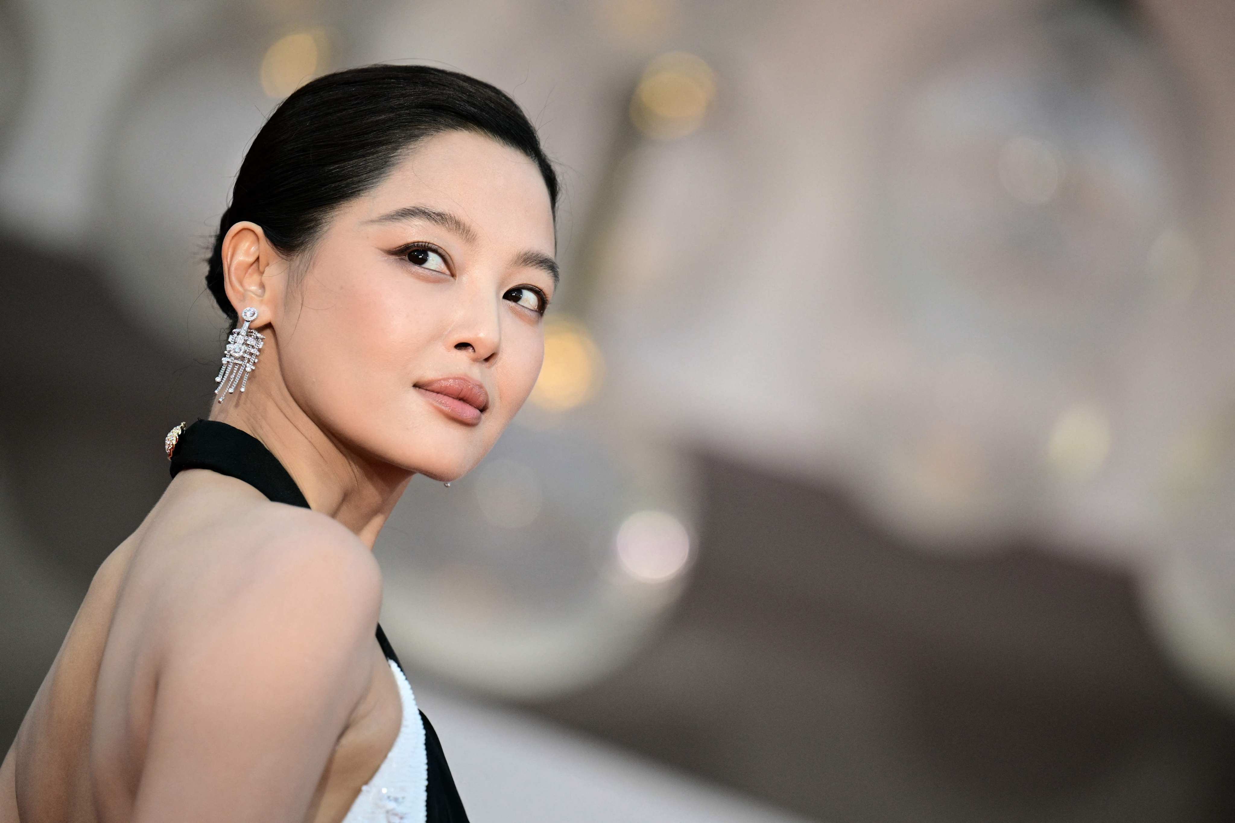 Chinese actress Xin Zhilei on the red carpet for The Sun Rises on Us All at the 82nd International Venice Film Festival. Photo: AFP
