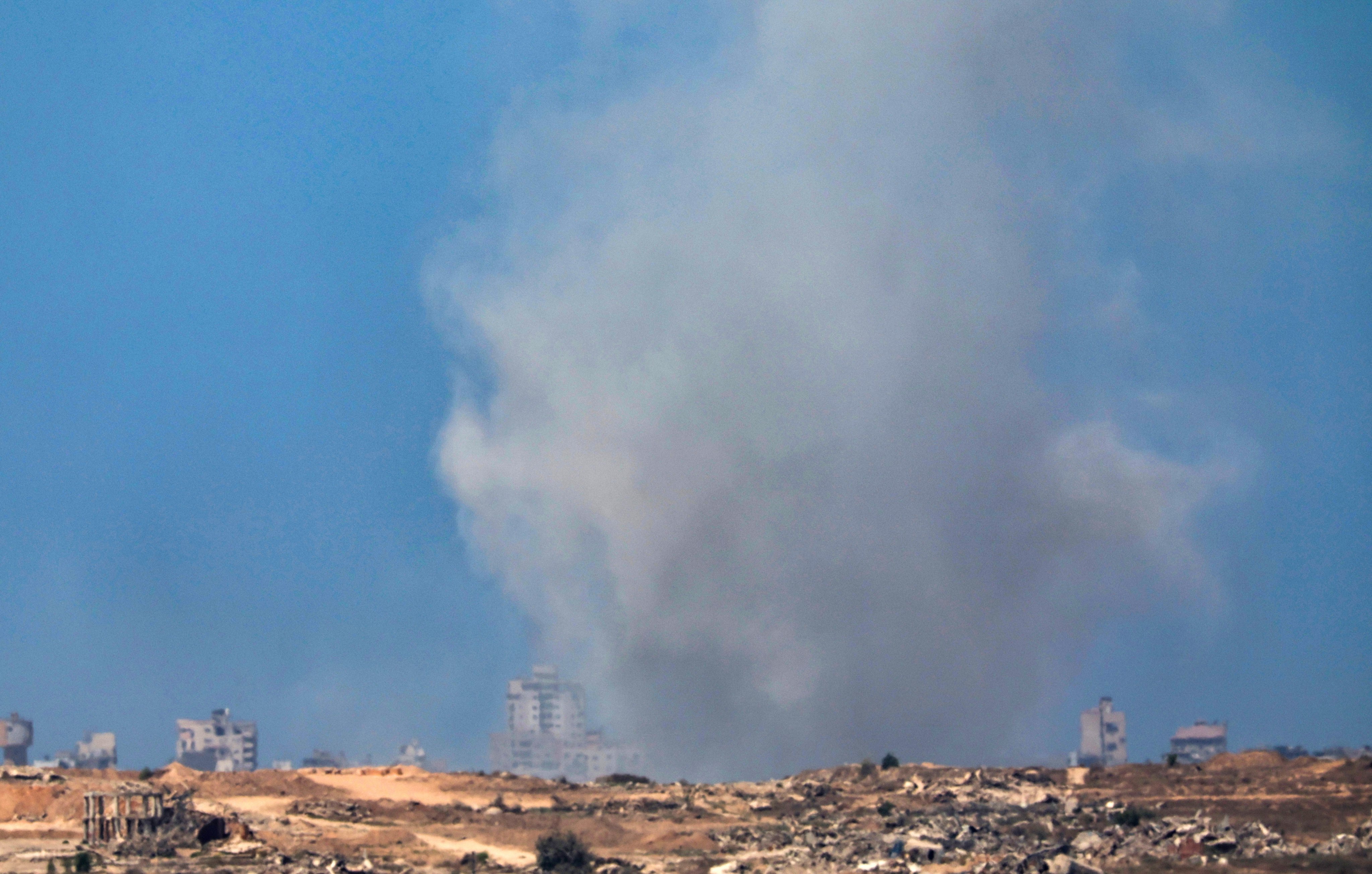 Smoke rises as a result of an Israeli air strike on the outskirts of Gaza City, as seen from the Israeli side of the border with Gaza in southern Israel, on Monday. Photo: EPA