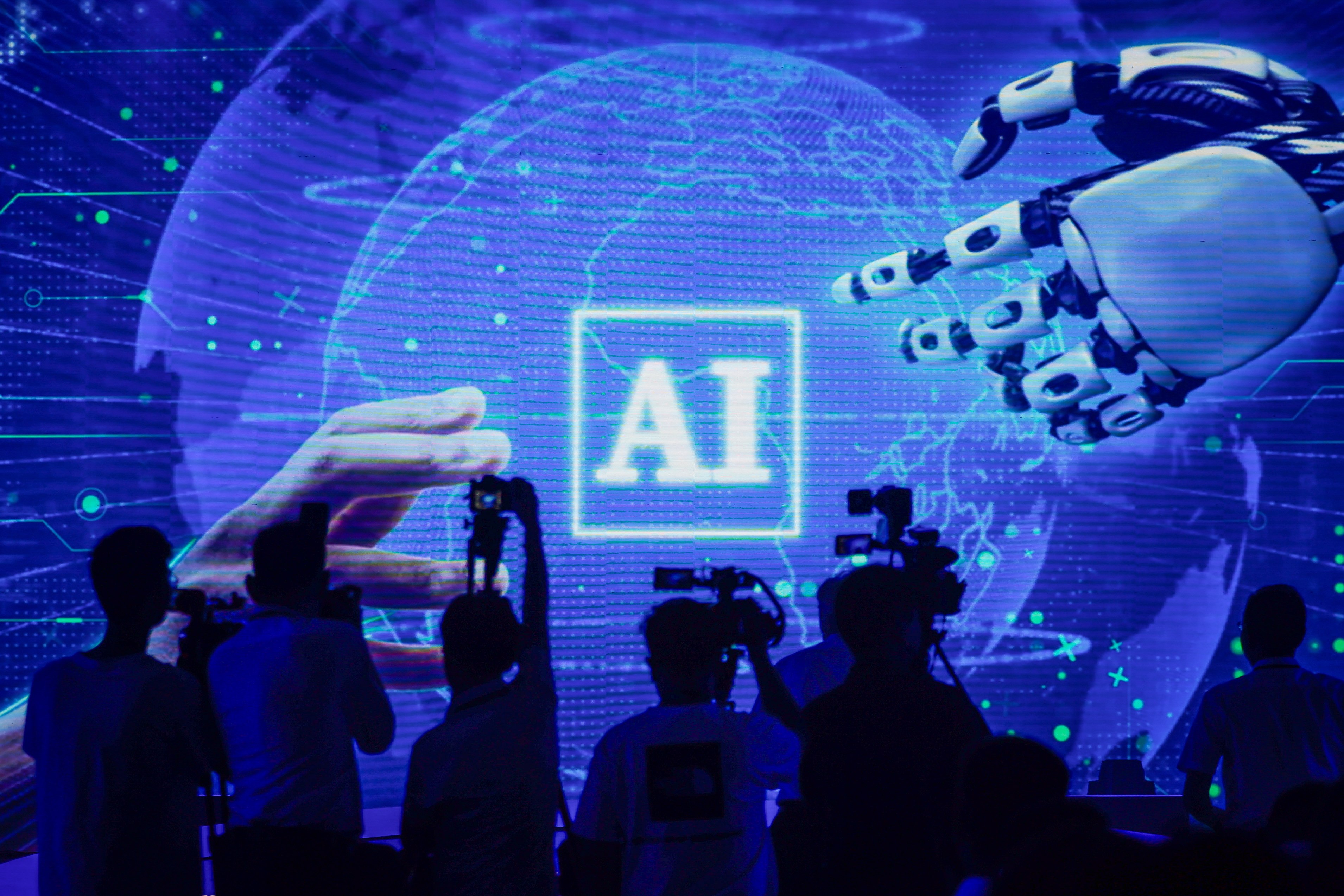 People attend the launch event of the first commercial application of artificial intelligence for the mining industry in Jinan, Shandong province, on July 18, 2023. Photo: EPA-EFE