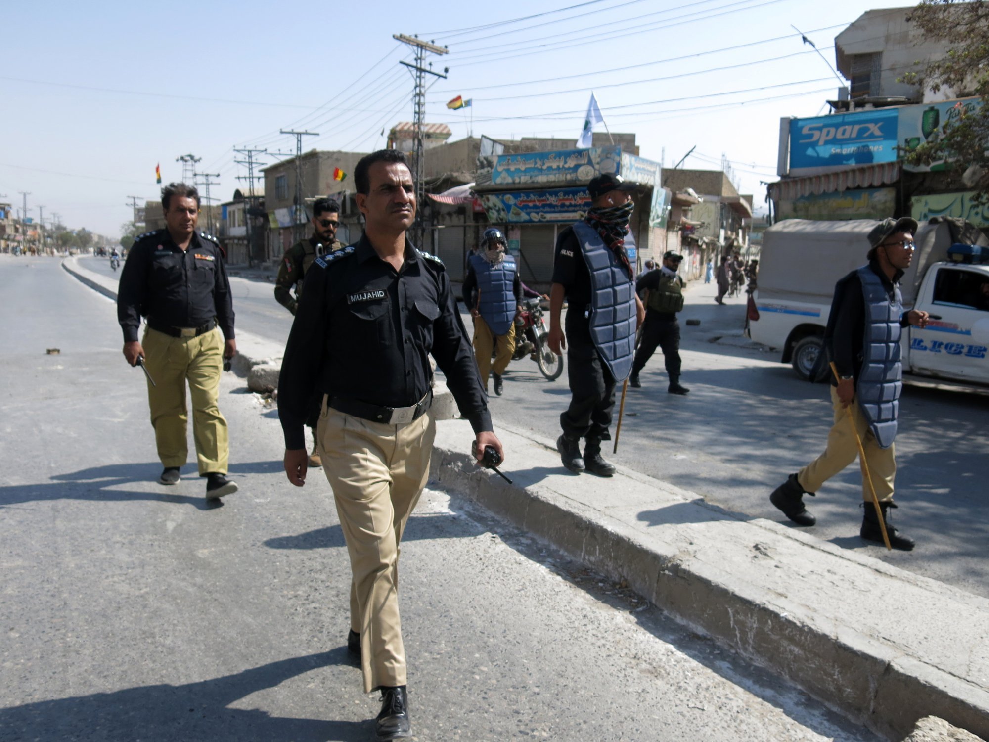 Police patrol after roads were blocked following opposition parties’ call for a strike to condemn the attack on a political rally of Balochistan National Party (BNP) in Quetta on Monday. Photo: EPA