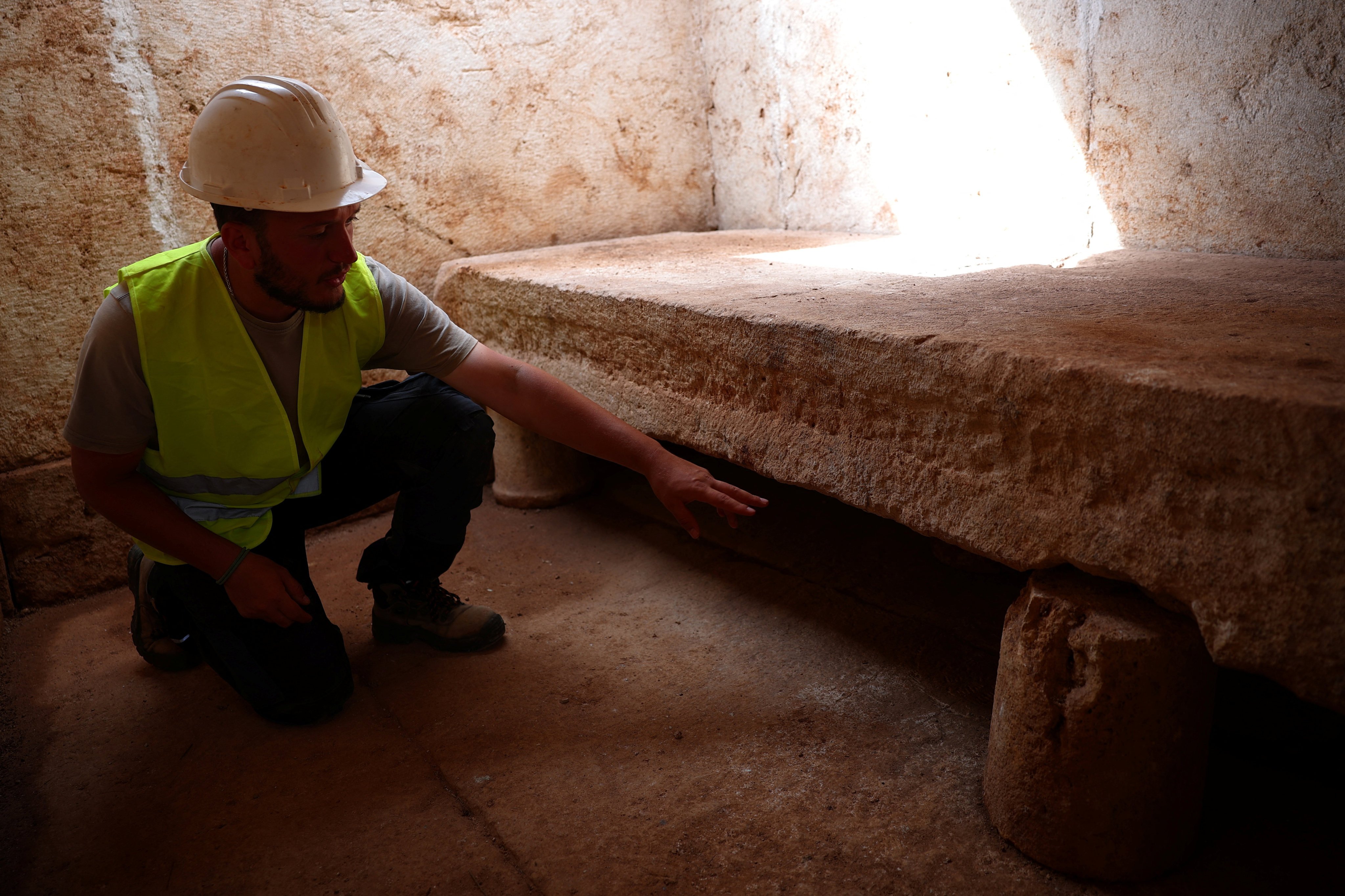 Erikson Nikolli, an archaeologist, gestures as he and his colleagues work on Albania’s first discovered monumental tomb in Strikcan, Albania, on Thursday. Photo: Reuters