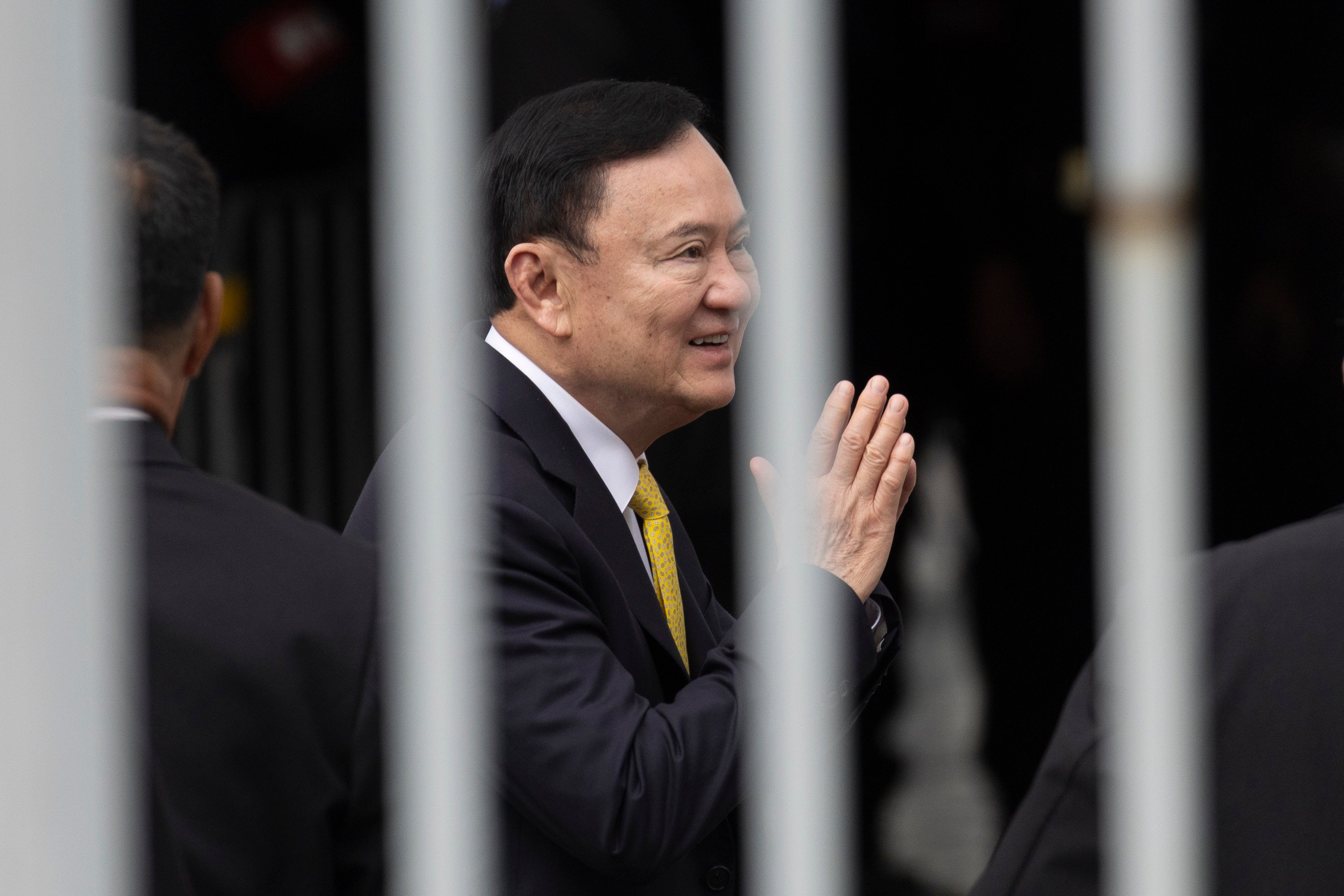Thailand’s former prime minister Thaksin Shinawatra arrives at the Supreme Court in Bangkok on Tuesday. Photo: AP