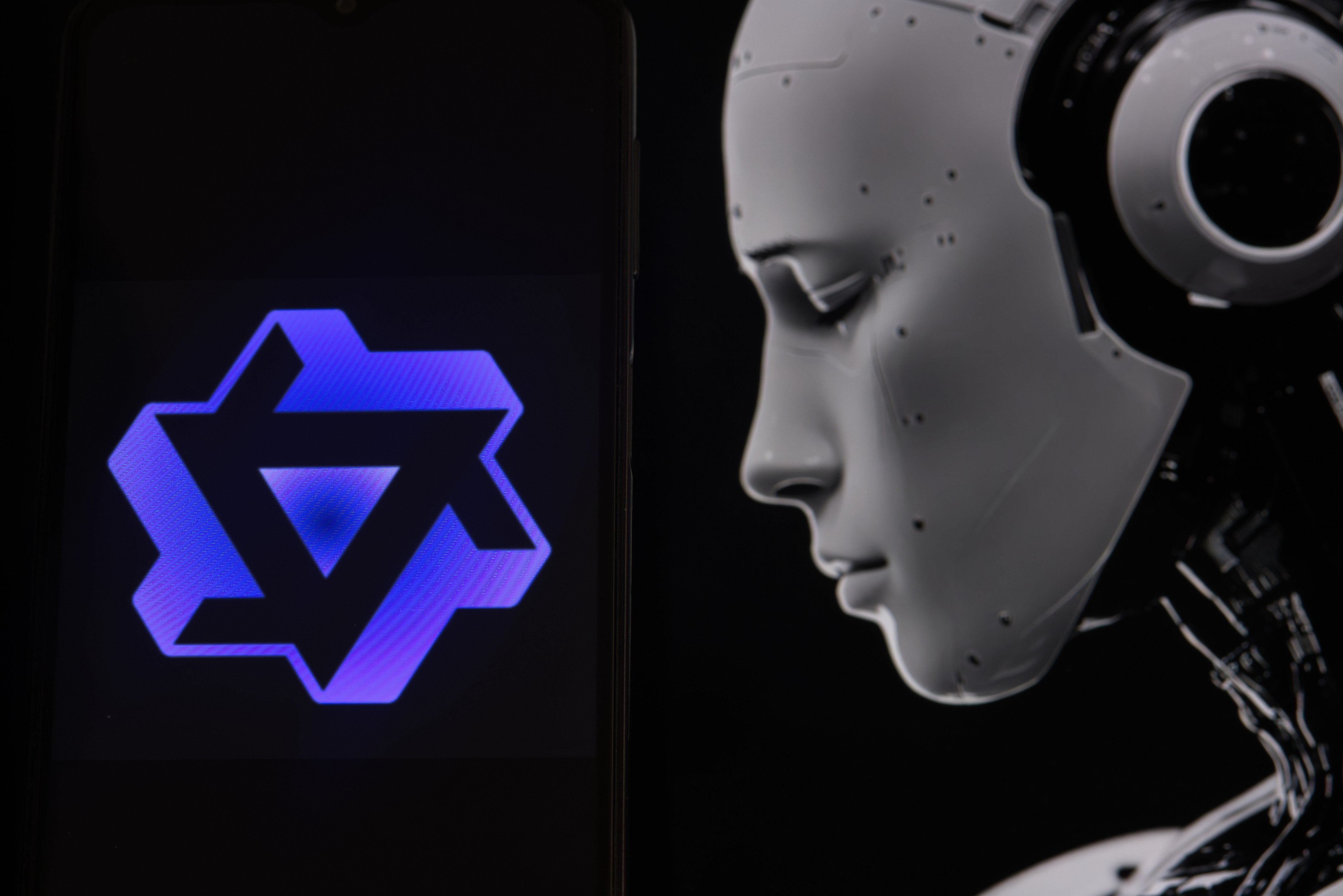 Alibaba’s Qwen logo seen next to a humanoid robot. Photo: Shutterstock Images