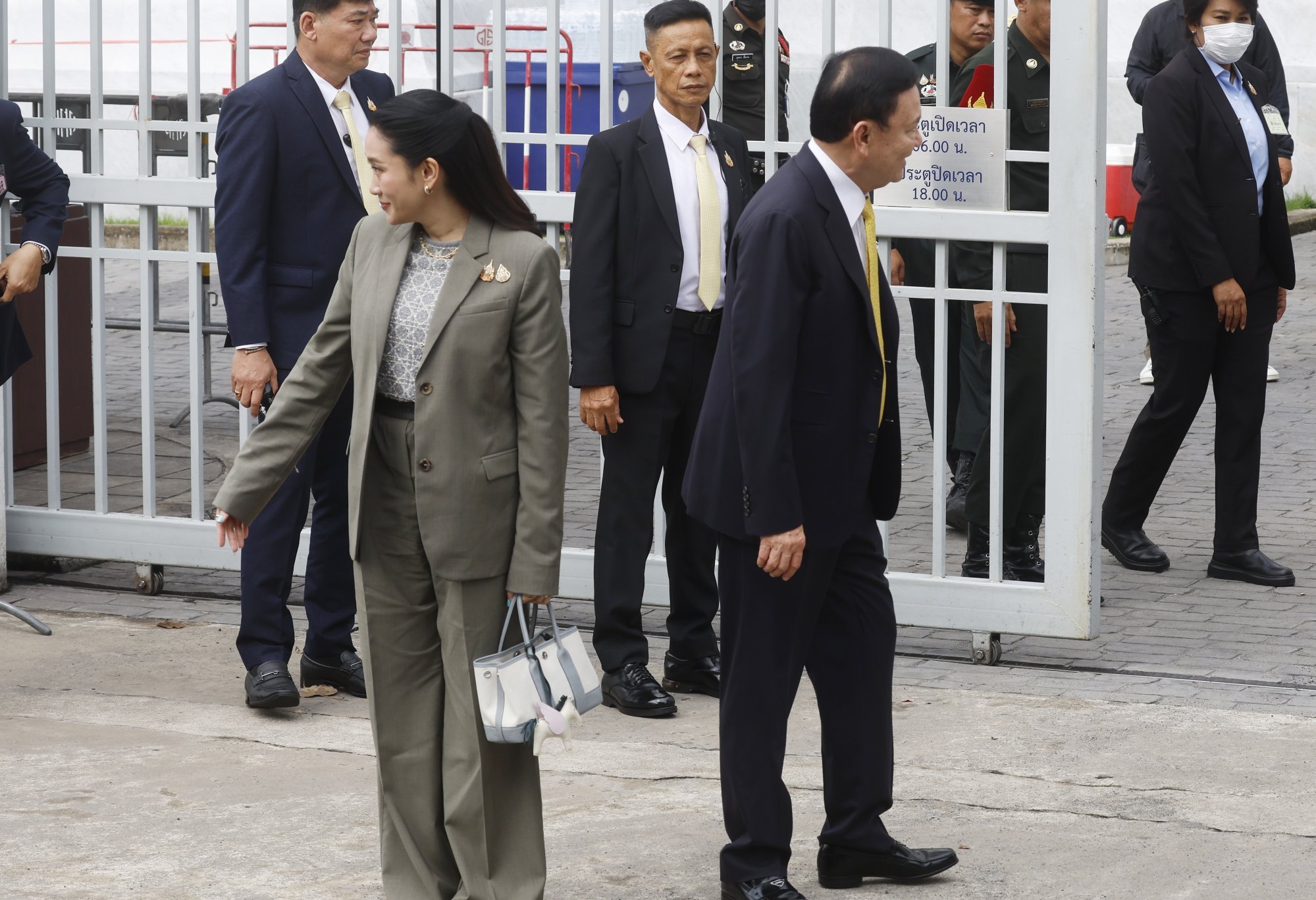 Thaksin Shinawatra with his daughter, former Thai prime minister Paetongtarn Shinawatra, outside the Supreme Court in Bangkok on Tuesday. Photo: EPA