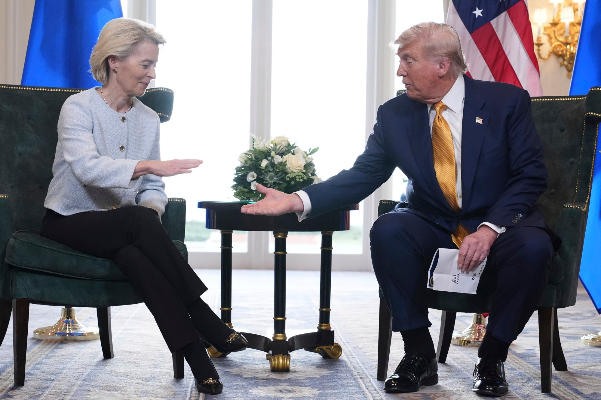 US President Donald Trump and European Commission President Ursula von der Leyen shake hands after reaching a trade deal at the Trump Turnberry golf course in Turnberry, Scotland, on July 27. Photo: AP