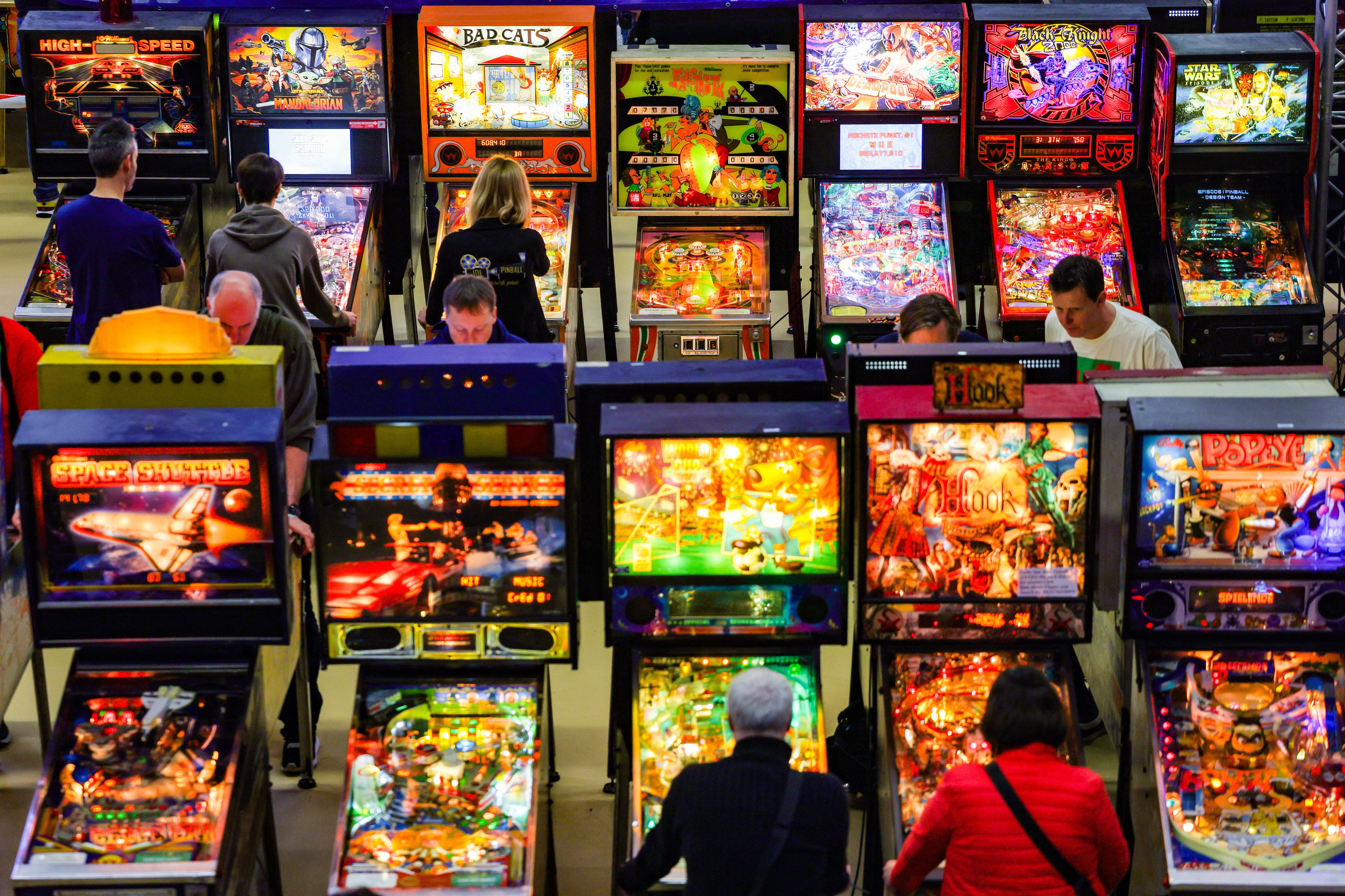FILED - Once written off as relics of smoky pubs, pinball machines are bouncing back. From Berlin to Chicago, enthusiasts are reviving the game’s flashing lights and clacking balls - and giving it a whole new generation of fans. Photo: Christoph Reichwein/dpa