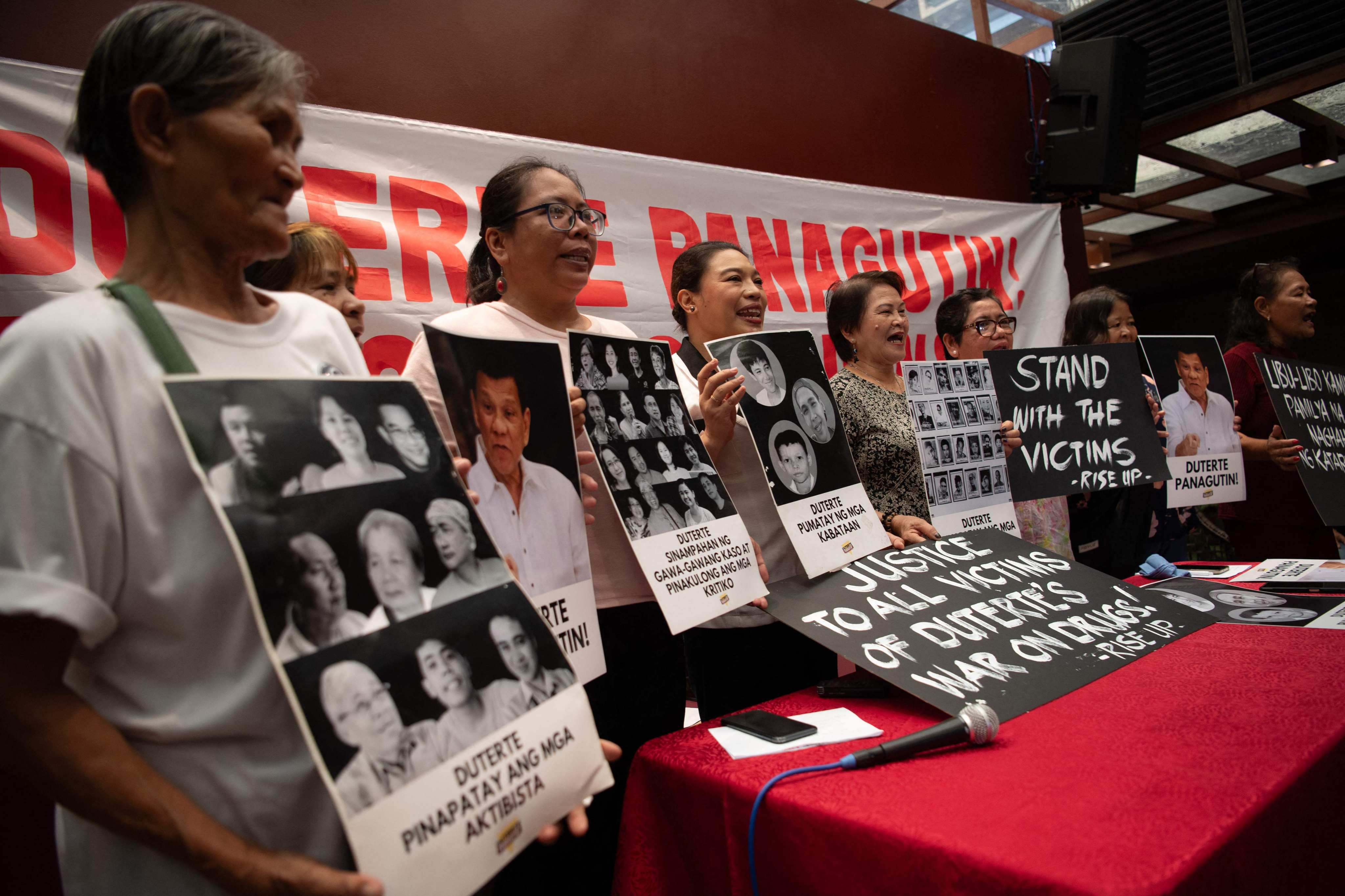 Placards showing victims of extrajudicial killings during former Philippine president Rodrigo Duterte’s drug war displayed at a media conference in Manila on Tuesday. Photo: AFP