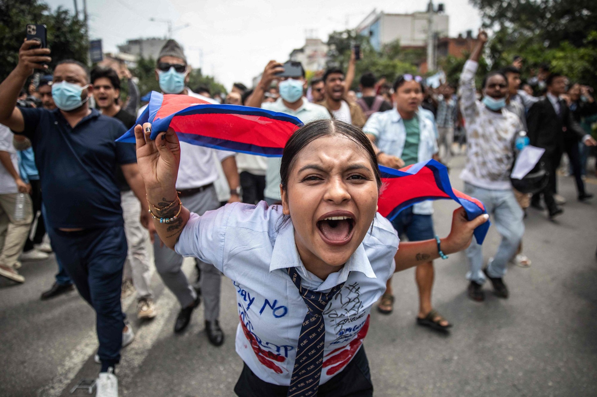 A demonstrator shouts slogans during the protest outside parliament in Kathmandu on Monday. Photo: AFP