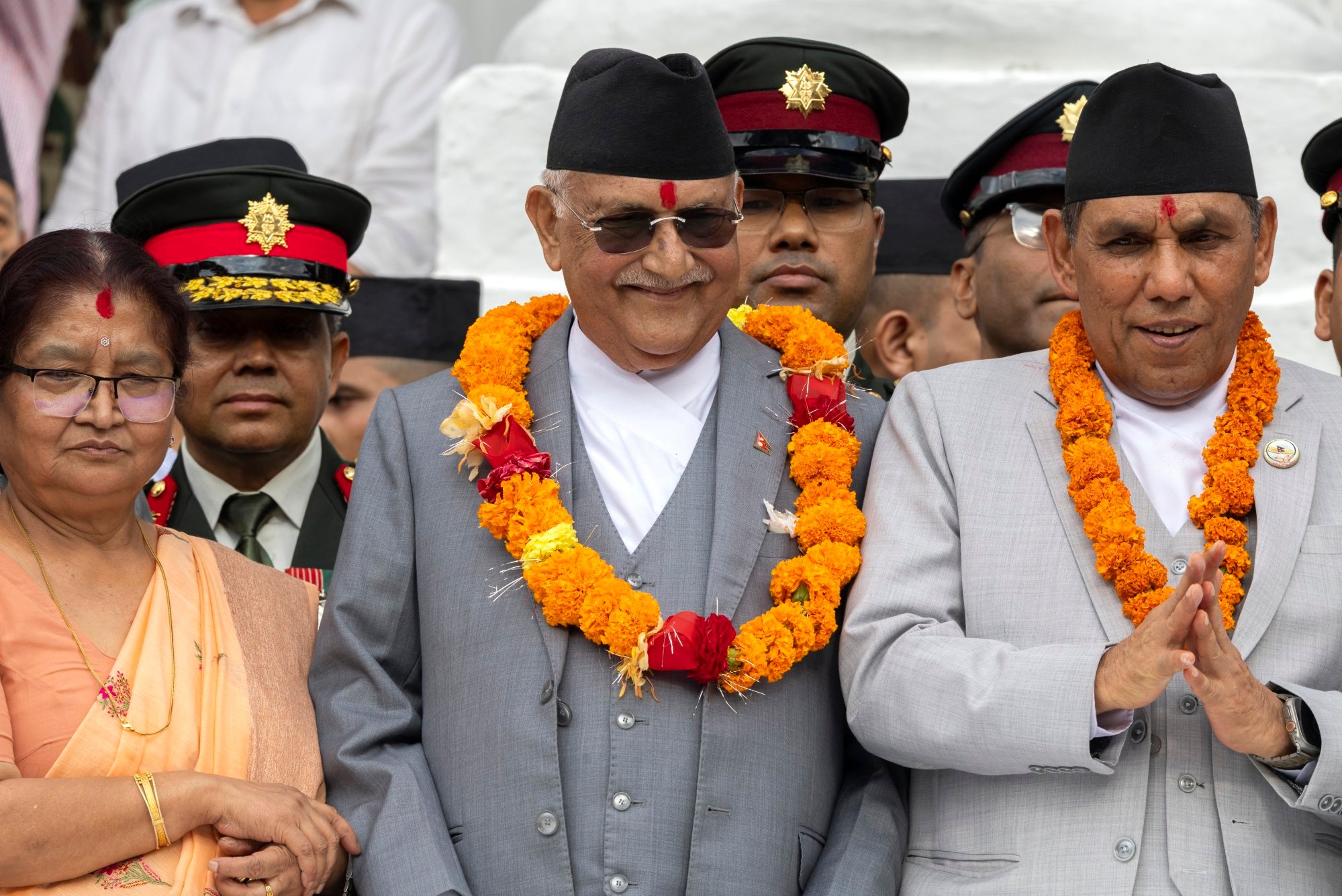Nepal’s Prime Minister K.P. Sharma Oli (centre) takes part in celebrations during the Indra Jatra festival in Kathmandu on Saturday. Photo: EPA