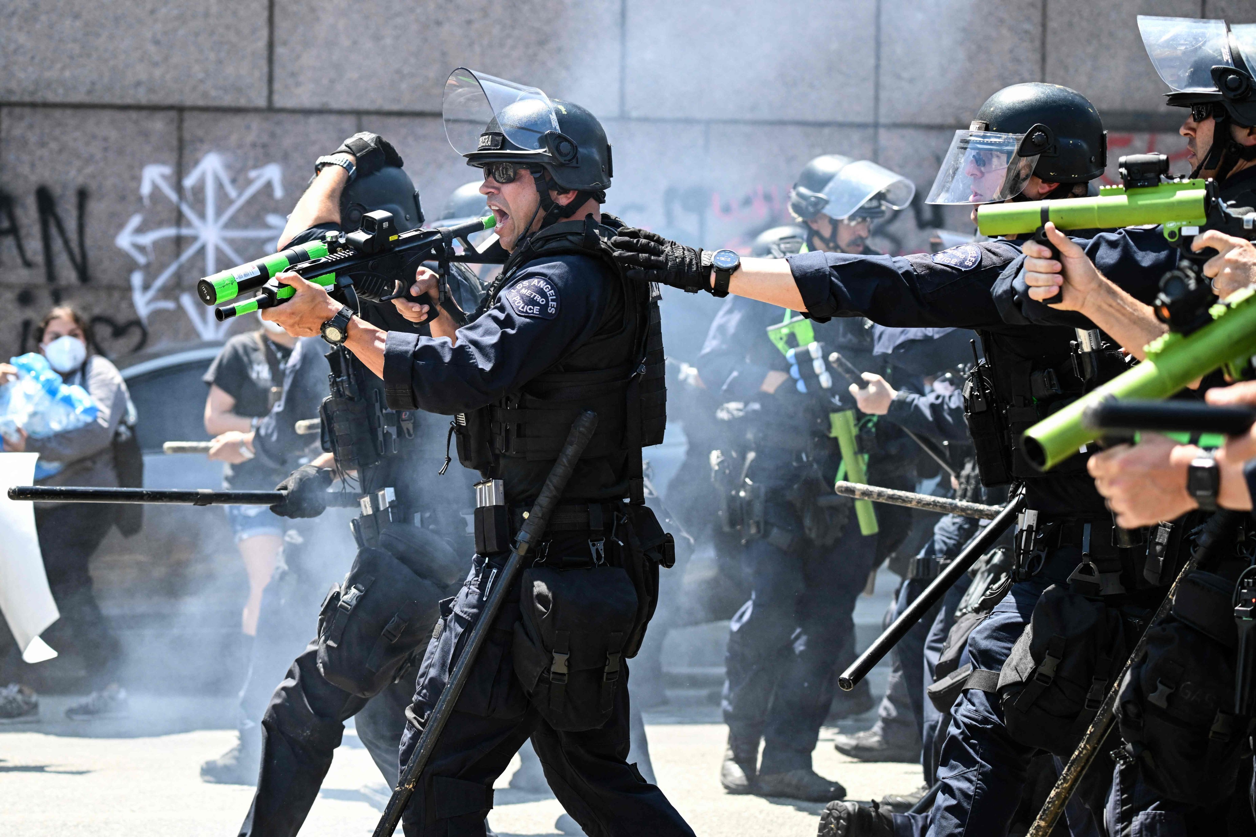 Police officers aim at immigration protesters during clashes outside the Federal Building in Los Angeles in June. The Supreme Court on Monday again backed Trump’s hardline immigration approach. Photo: AFP