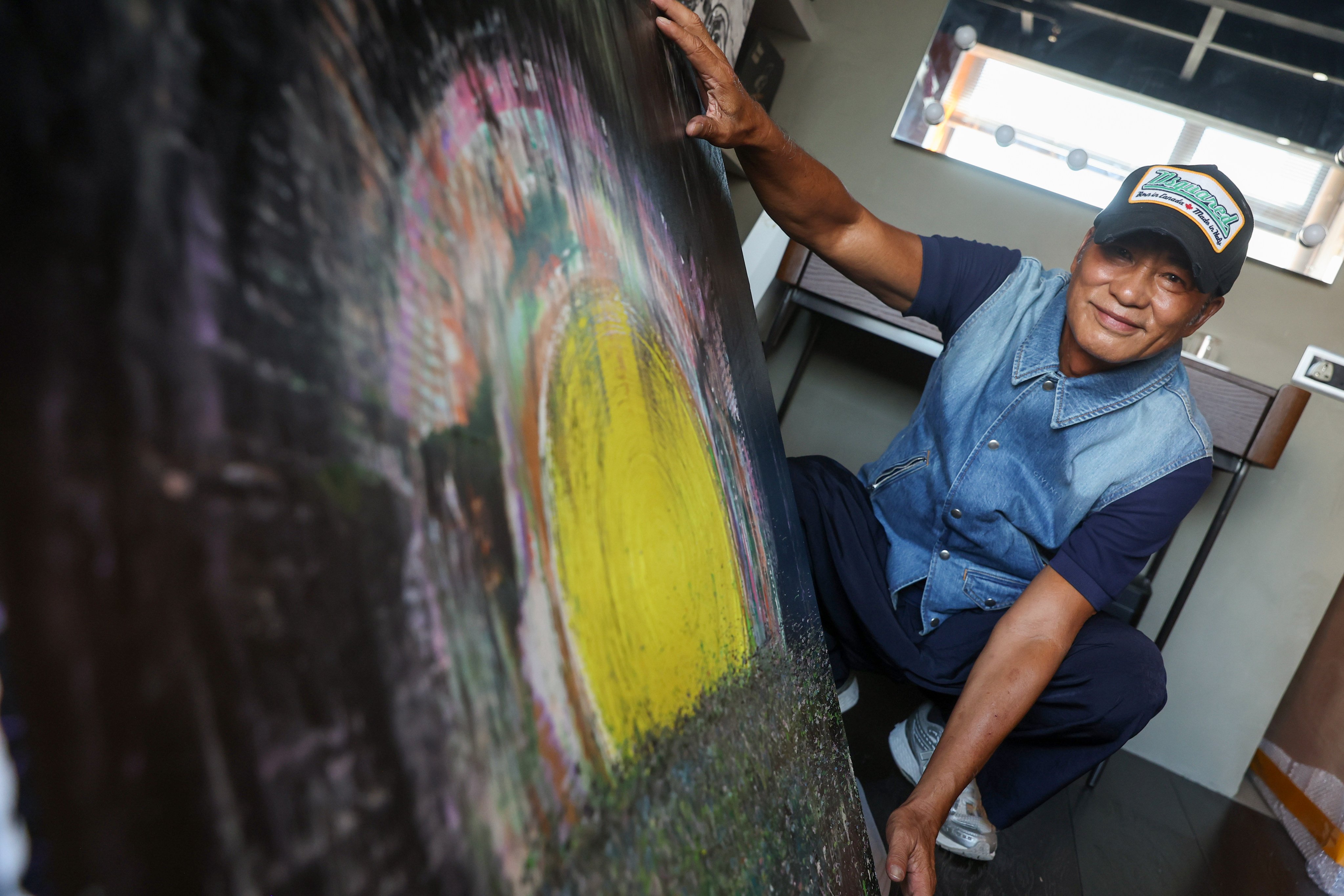 Veteran Hong Kong actor Simon Yam is pictured at his studio in the city’s Chai Wan neighbourhood. The 70-year-old, who got into painting and photography after big-screen success, says his creative outlets are all “interconnected”. Photo: Edmond So