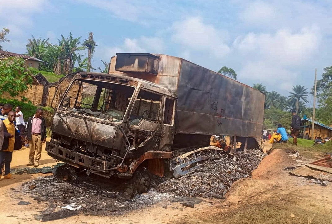 A charred wreckage of a truck following an attack by Islamic State-affiliated Allied Democratic Forces (ADF) rebels. Photo: Reuters