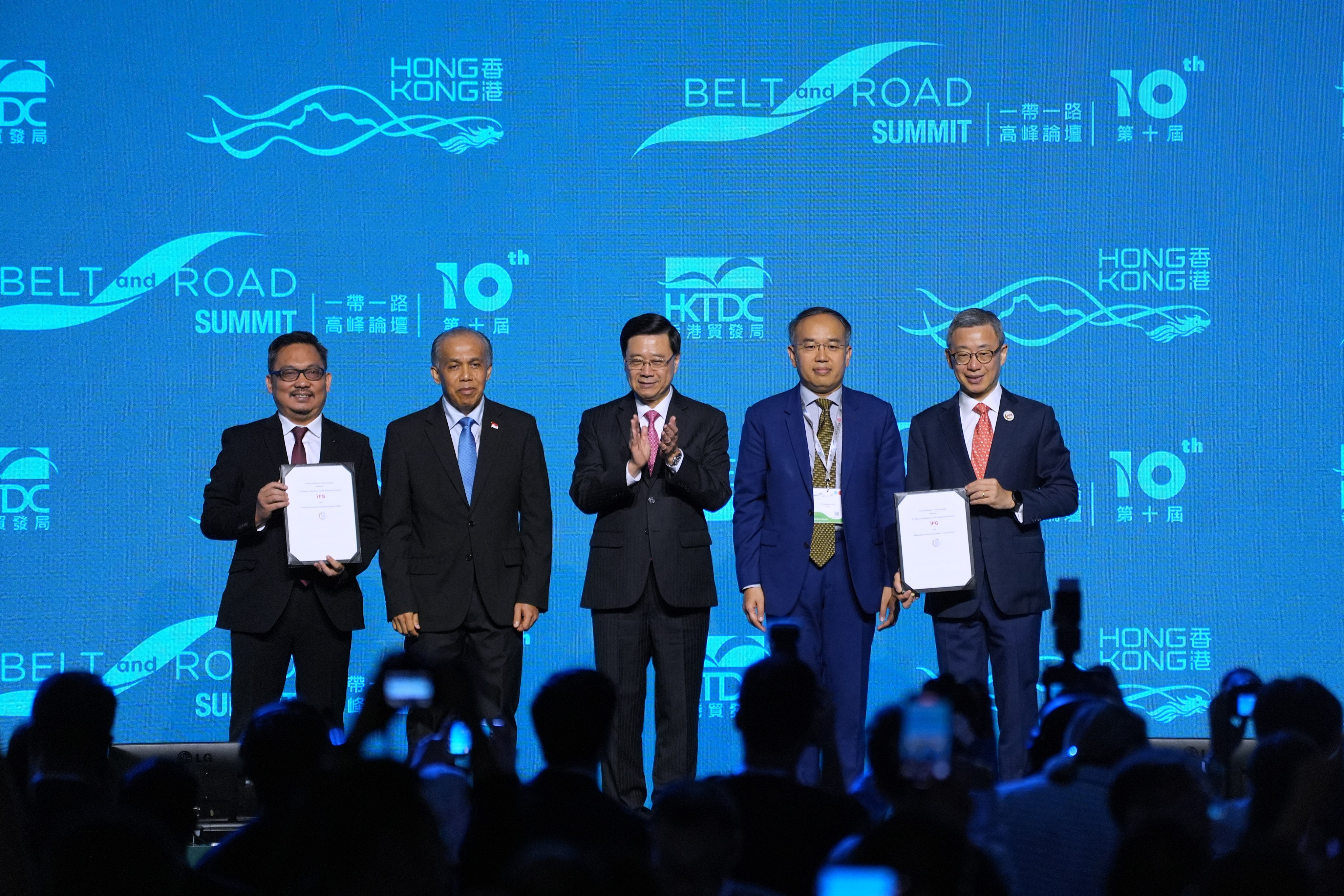 City leader John Lee (centre) and treasury chief Hui Ching-yu (second from right) preside over a memorandum signing ceremony at the 10th Belt and Road Summit. Photo: Elson Li