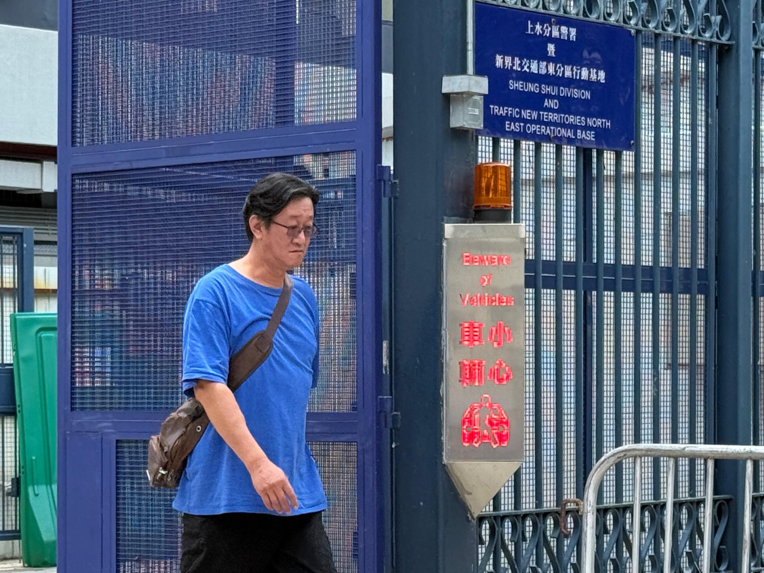 Ng Chiu-fai, 55, the father of wanted Hong Kong activist Agnes Ng, leaves Sheung Shui Police Station on Thursday. Photo: Handout