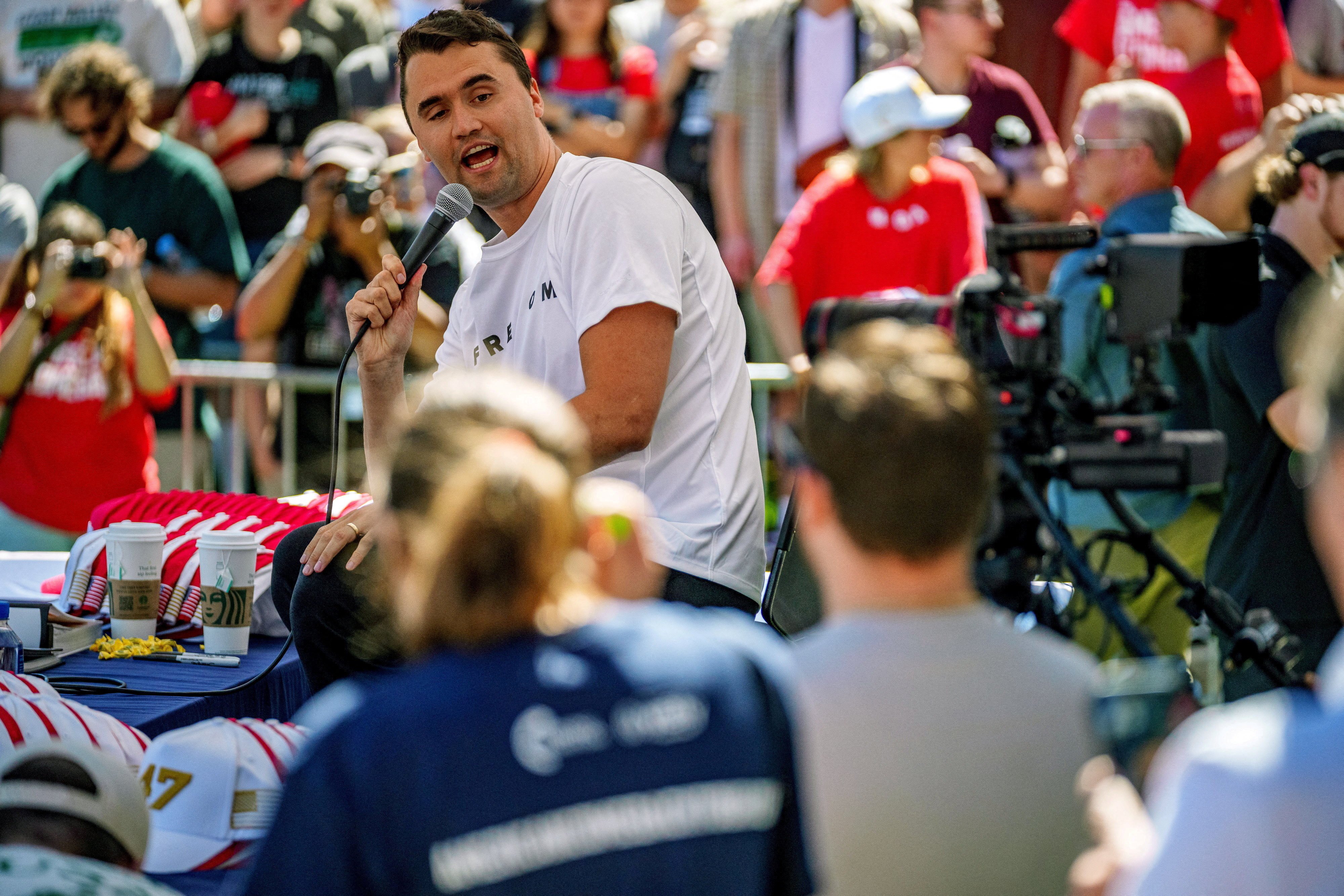 Charlie Kirk at the speaking event where he was shot. The Salt Lake Tribune via Reuters