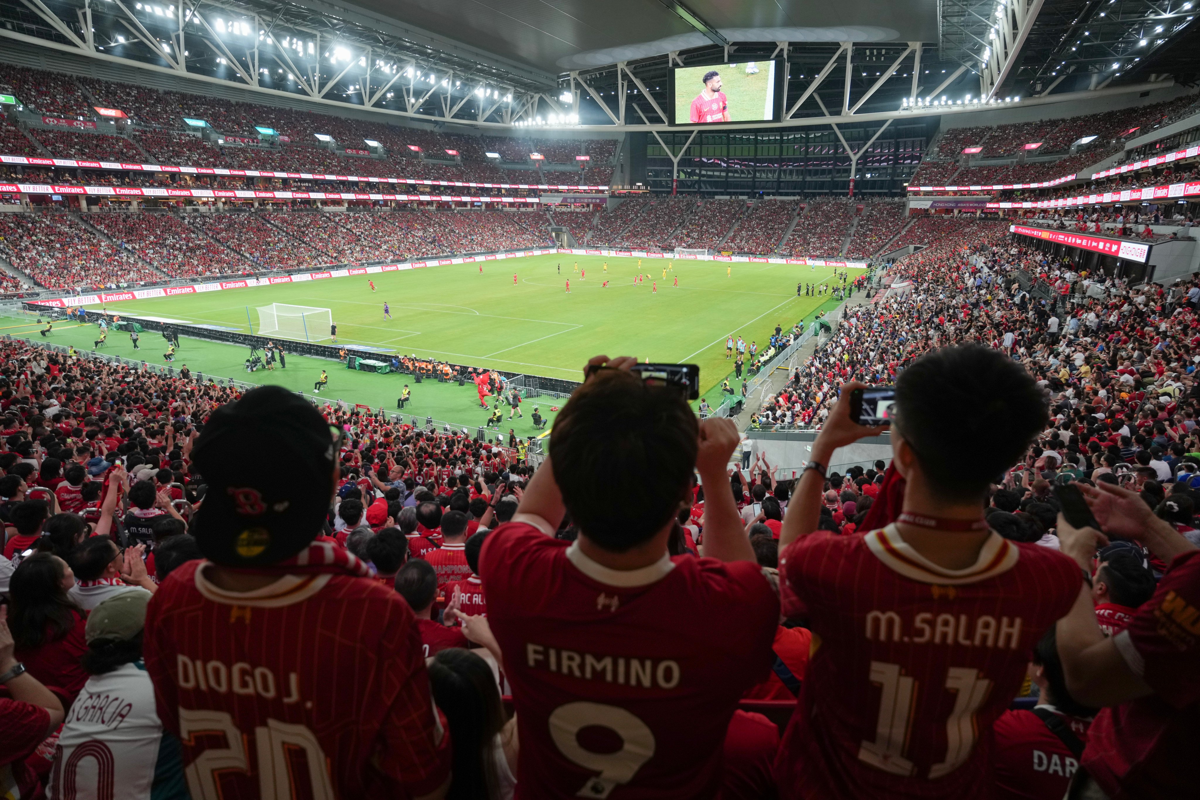 Fans watch Liverpool taking on AC Milan during the Hong Kong Football Festival at Kai Tak Stadium in July. Photo: Sam Tsang
